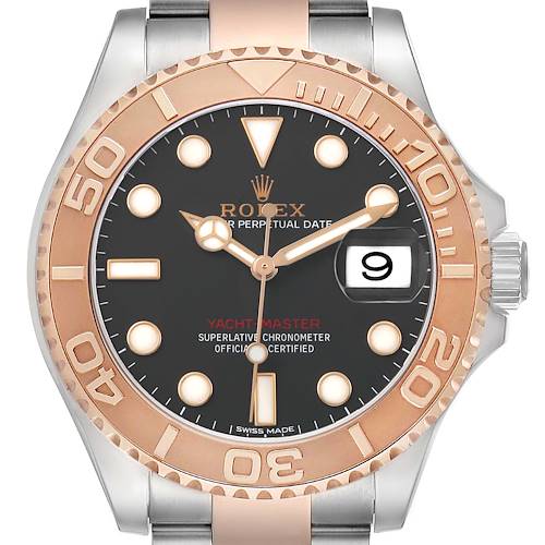 The watch is shown from the front, highlighting the dial, bezel, hands, date window, and part of the bracelet.