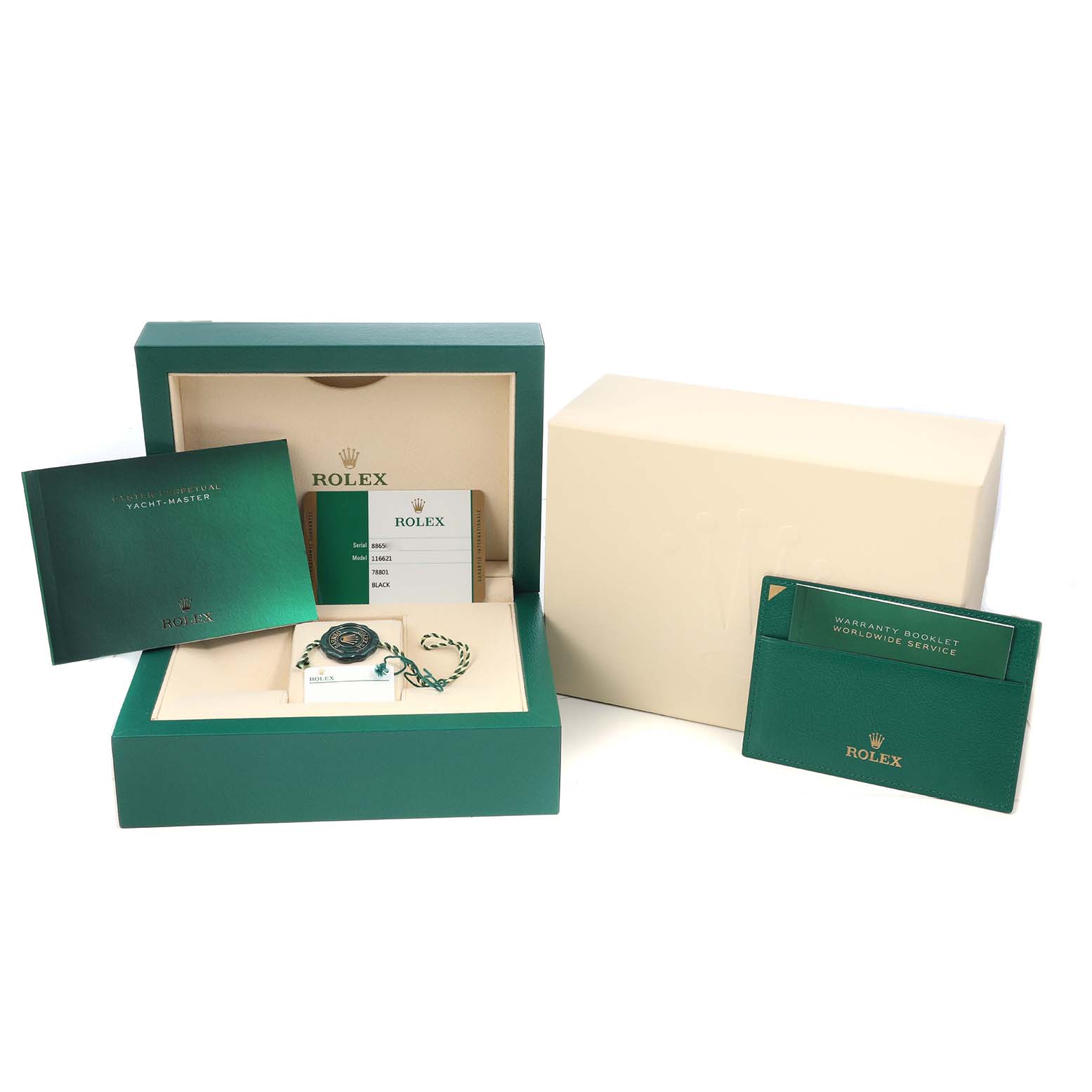 The image shows the packaging and accessories of a Rolex Yacht-Master 116621 Men's Steel and Gold (two tone) Black Dial, including the box, booklet, and warranty card.