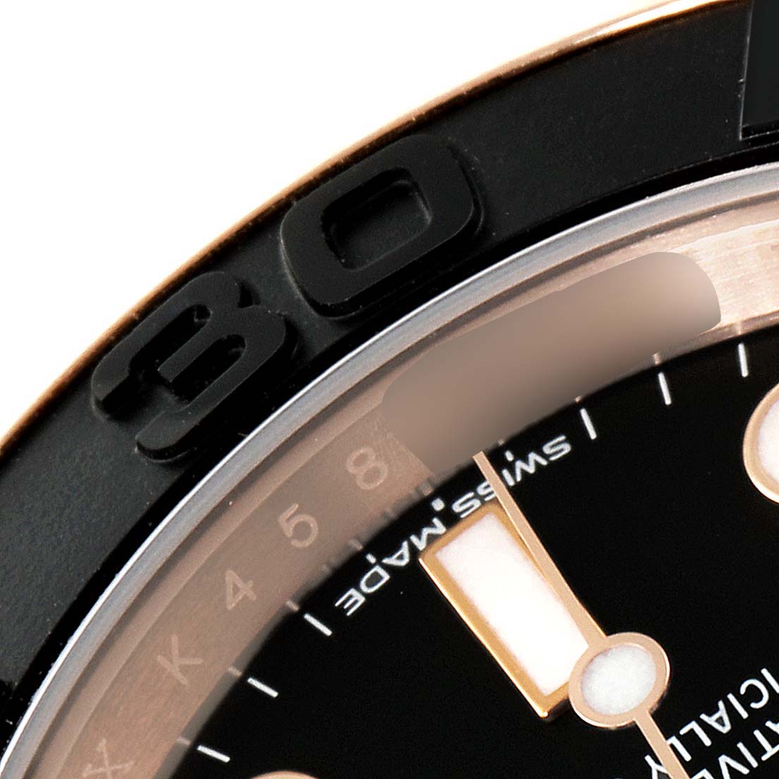 This close-up image of the Rolex Yacht-Master 116655 Men
s Rose Gold Black Dial 116655 Men
s Rose Gold Black Dial watch shows a partial view of the bezel and dial.