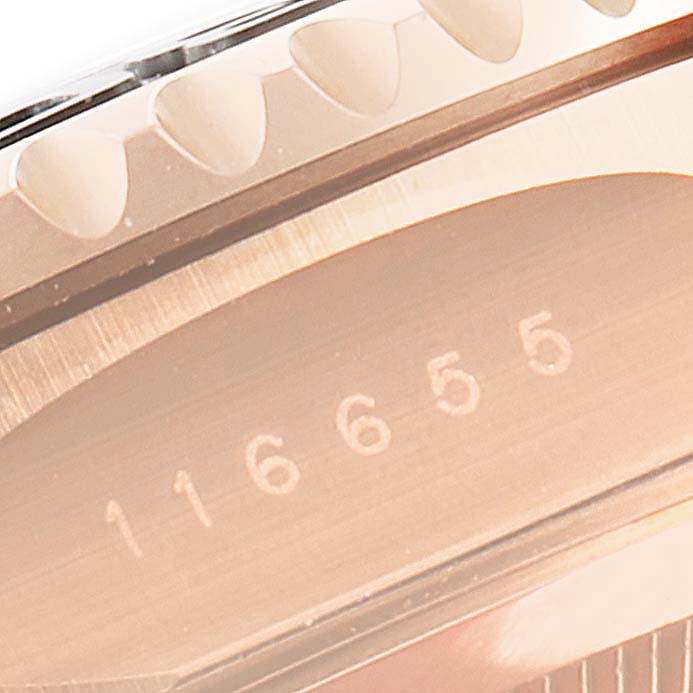 This is a close-up angle showing the bezel and part of the serial number of the Rolex Yacht-Master 116655 Men
s Rose Gold Black Dial 116655 Men
s Rose Gold Black Dial watch.