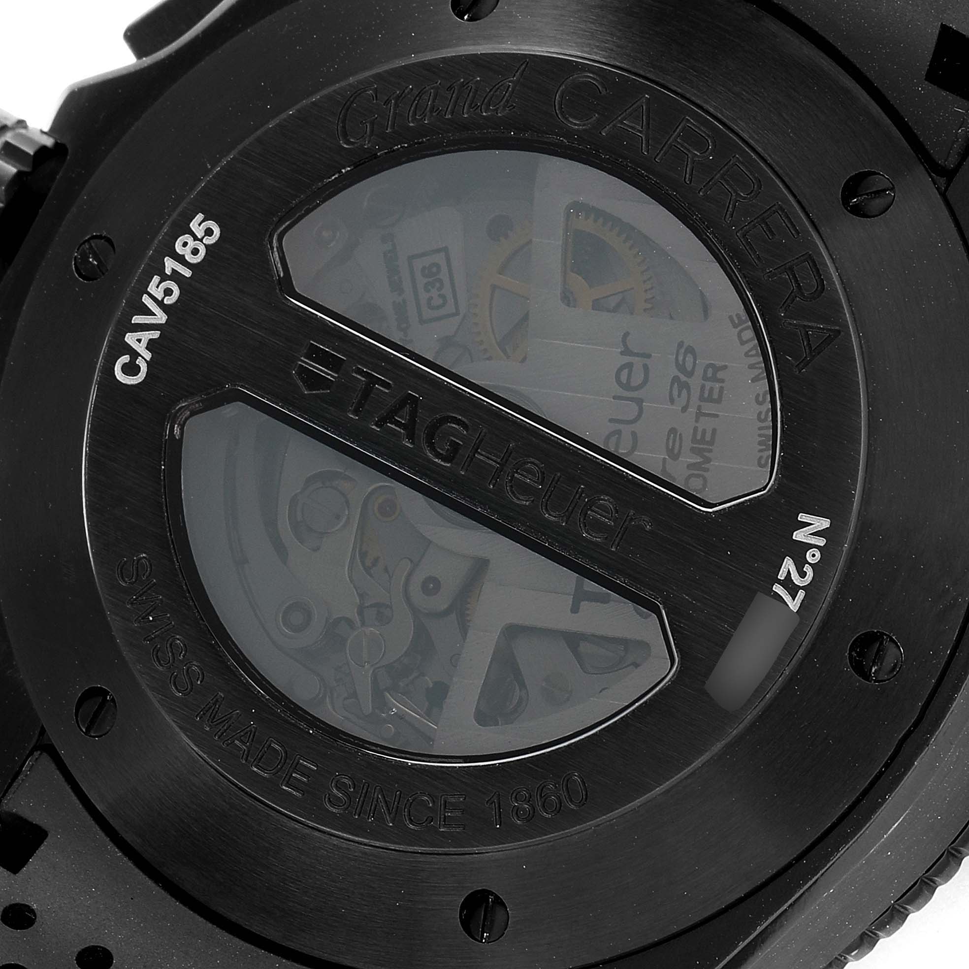 This image shows the back of the Carrera model by Tag Heuer, highlighting the watch movement through a transparent case.