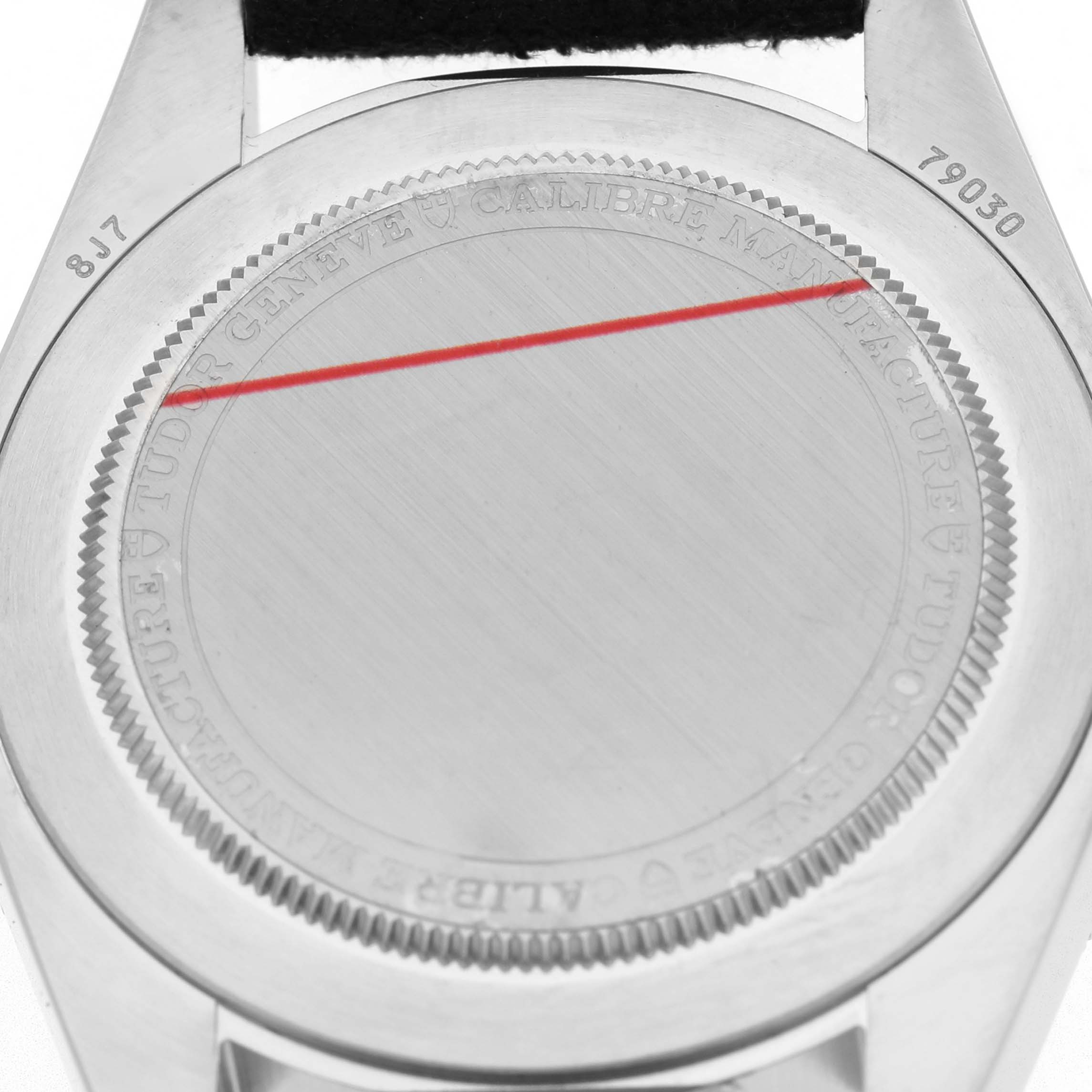 The image shows the case back of a Tudor Heritage Black Bay 79030 Men's Stainless Steel Blue Dial watch from a top-down angle.