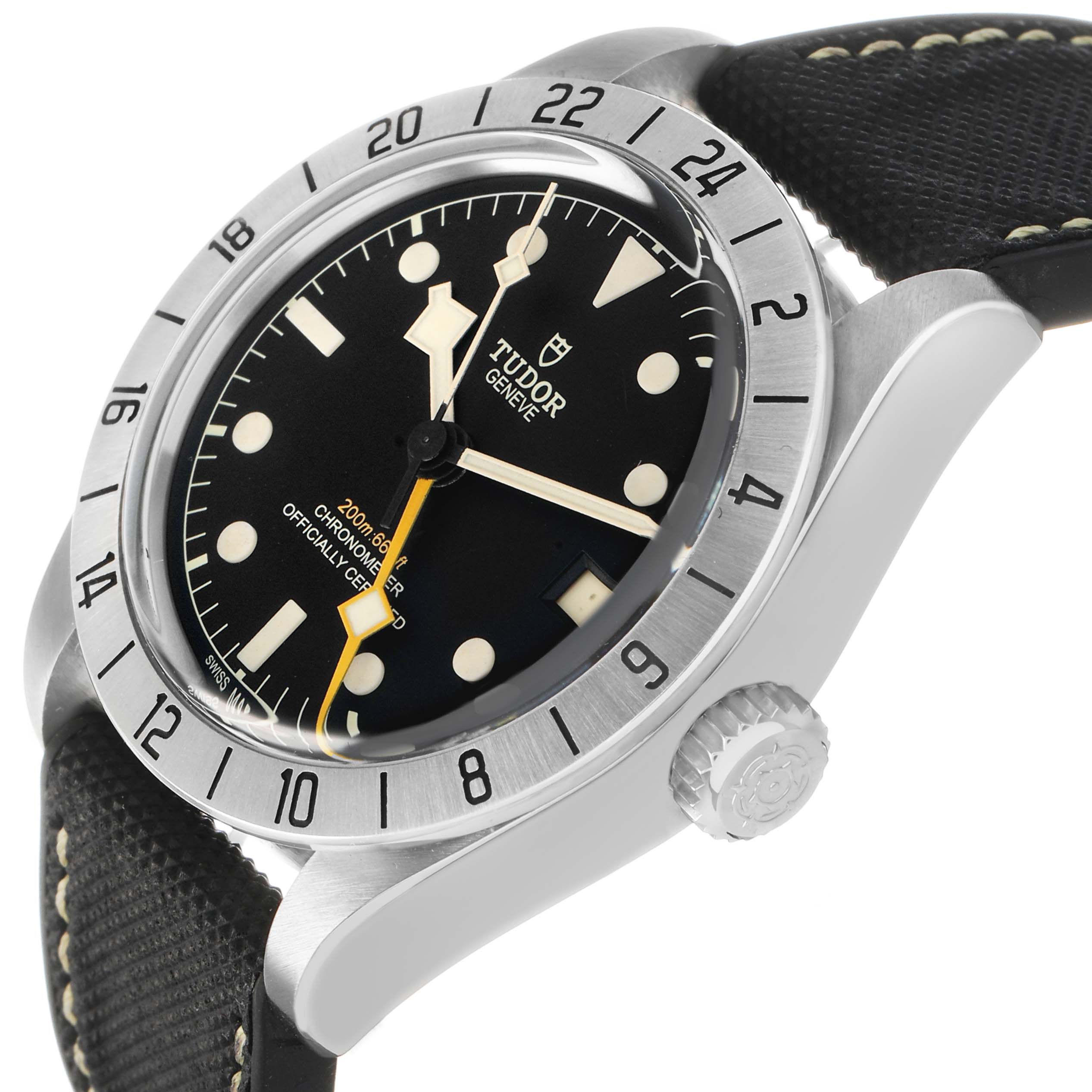 The Tudor Heritage Black Bay 79470 Men's Stainless Steel Black Dial watch is shown from a side angle, highlighting its bezel, crown, and black strap.
