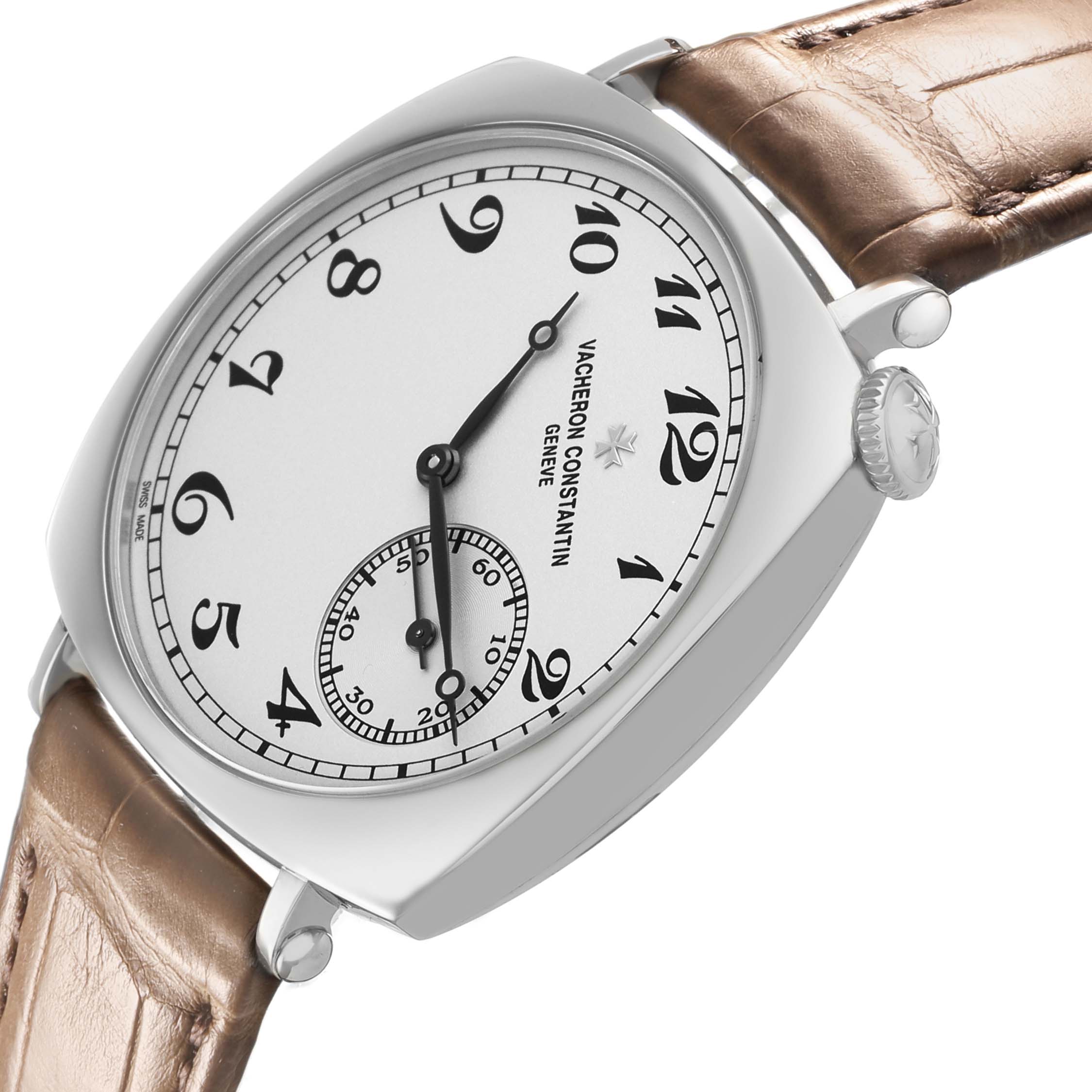 The Vacheron Constantin Historiques 1100S Men's White Gold Silver Dial watch is shown at a tilted angle, highlighting the dial, crown, and leather strap.