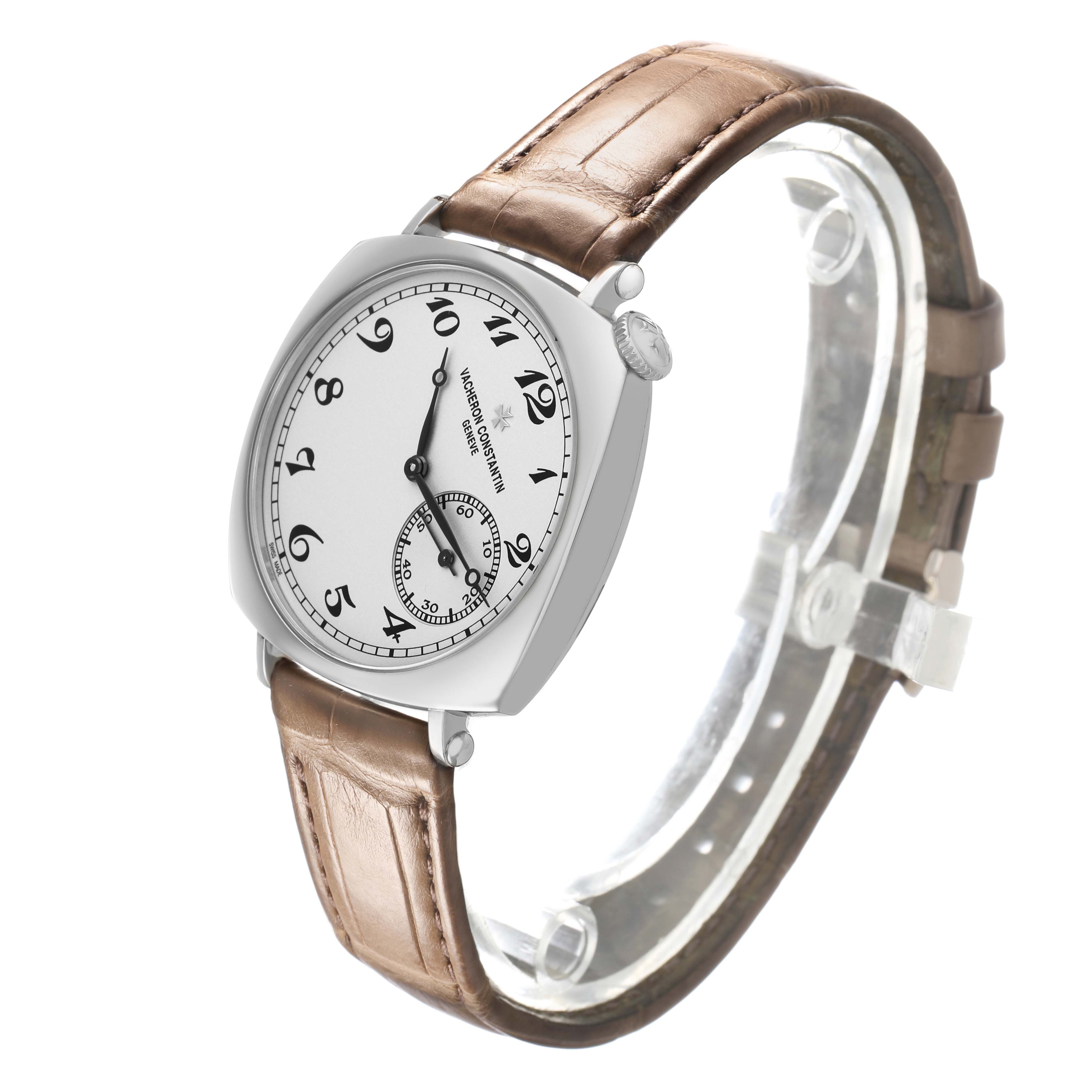 The Vacheron Constantin Historiques 1100S Men's White Gold Silver Dial watch is shown at an angled side view, highlighting the dial, case, crown, and leather strap.