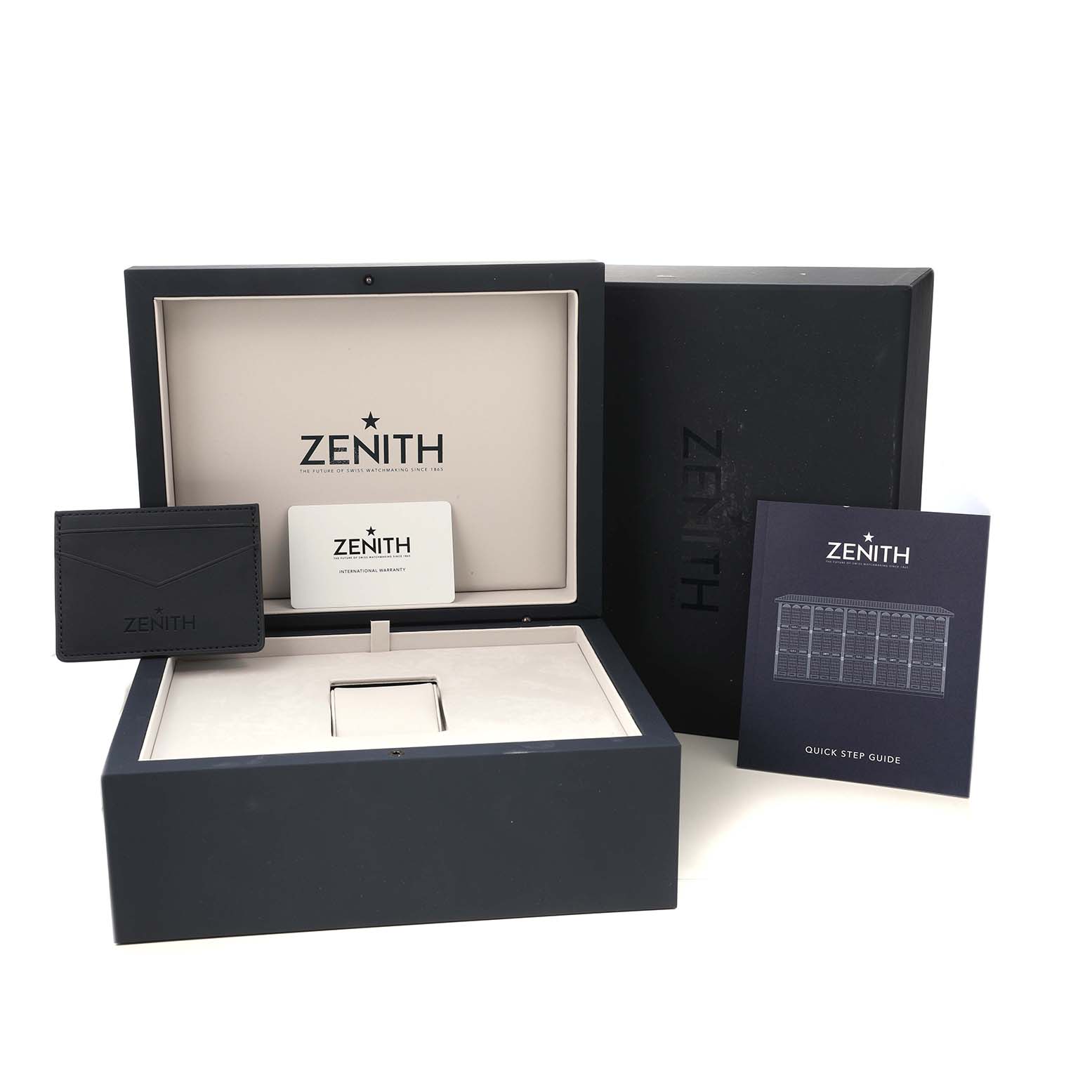 The image shows a Zenith Chronomaster 03.3105.3600 Men's Stainless Steel Blue Dial watch box, cardholder, and quick step guide from a front angle.