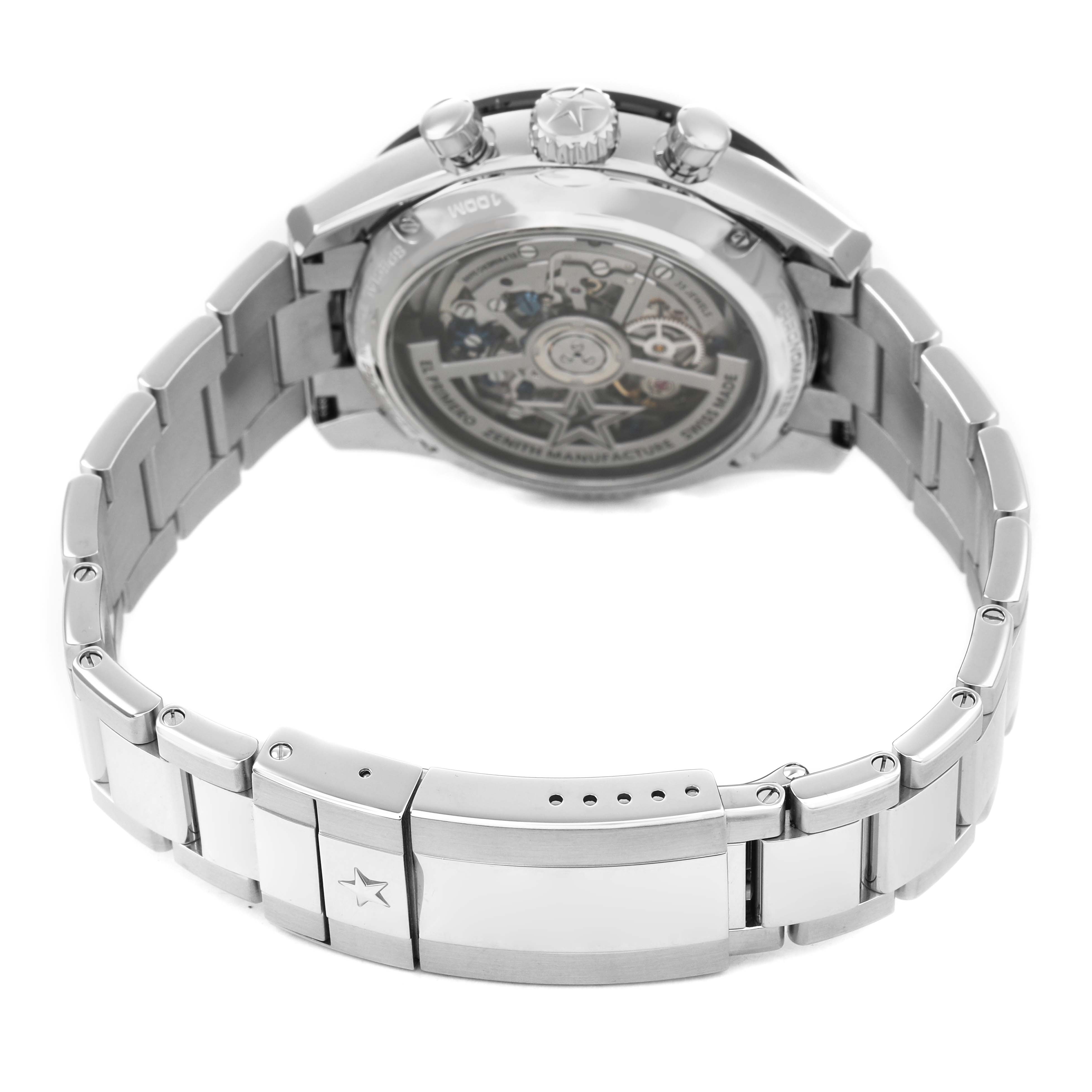 The image shows the back view of a Zenith Chronomaster 03.3105.3600 Men's Stainless Steel Blue Dial watch, highlighting its open case back and metal bracelet.