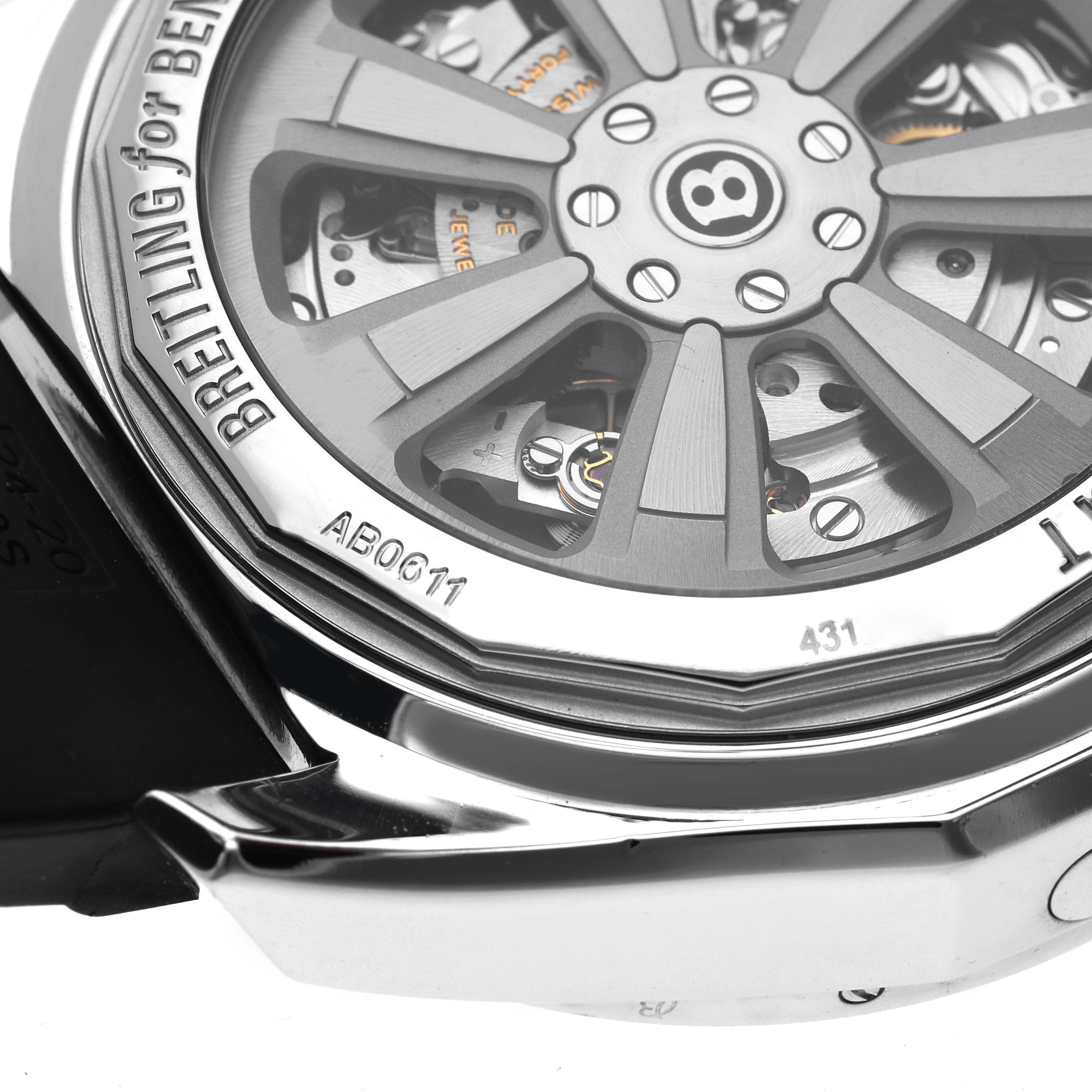 The Bentley by Breitling watch is shown from a close-up rear angle, highlighting the rotor and movement details.