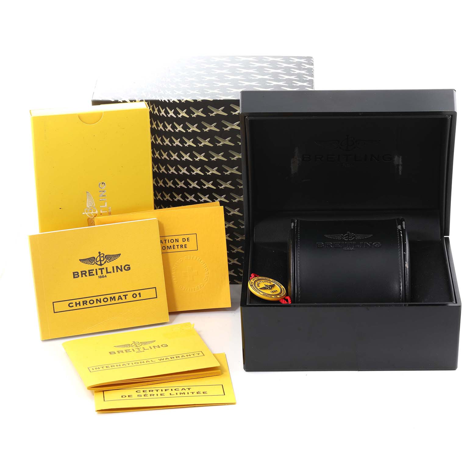 This image shows the packaging, case, and documentation for a Breitling Chronomat AB011110/BA50-SS Men's Stainless Steel Black Dial AB011110/BA50-SS Men's Stainless Steel Black Dial watch.