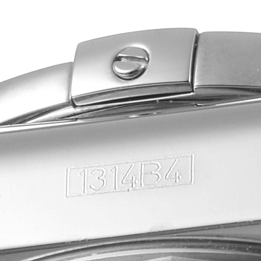 This close-up shows the clasp and part of the bracelet with the engraved serial number on a Breitling Chronomat AB0141 Men
s Stainless Steel Black Dial AB0141 Men
s Stainless Steel Black Dial watch.