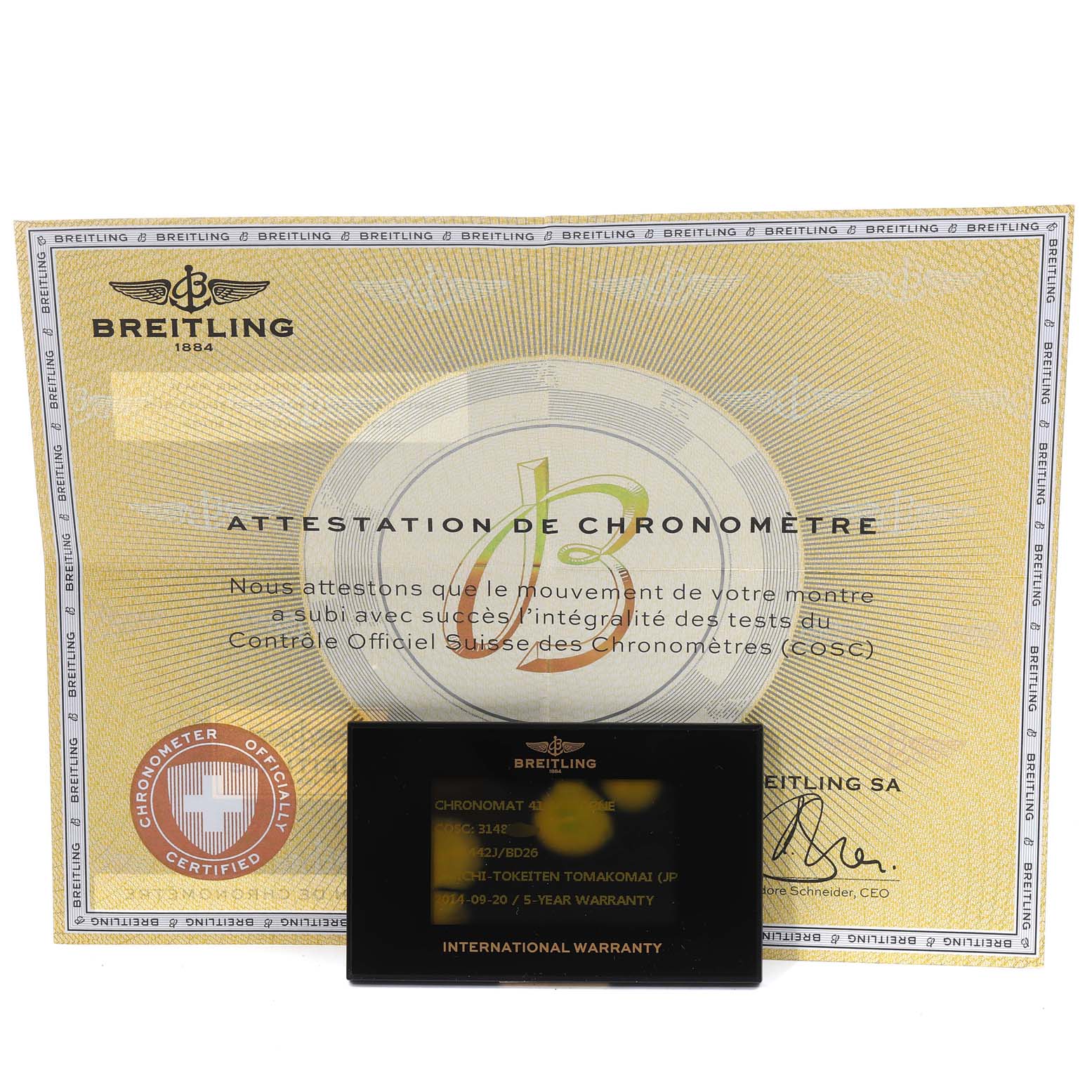 The image shows the warranty card and chronometer certificate for the Breitling Chronomat AB0141 Men
s Stainless Steel Black Dial AB0141 Men
s Stainless Steel Black Dial model.