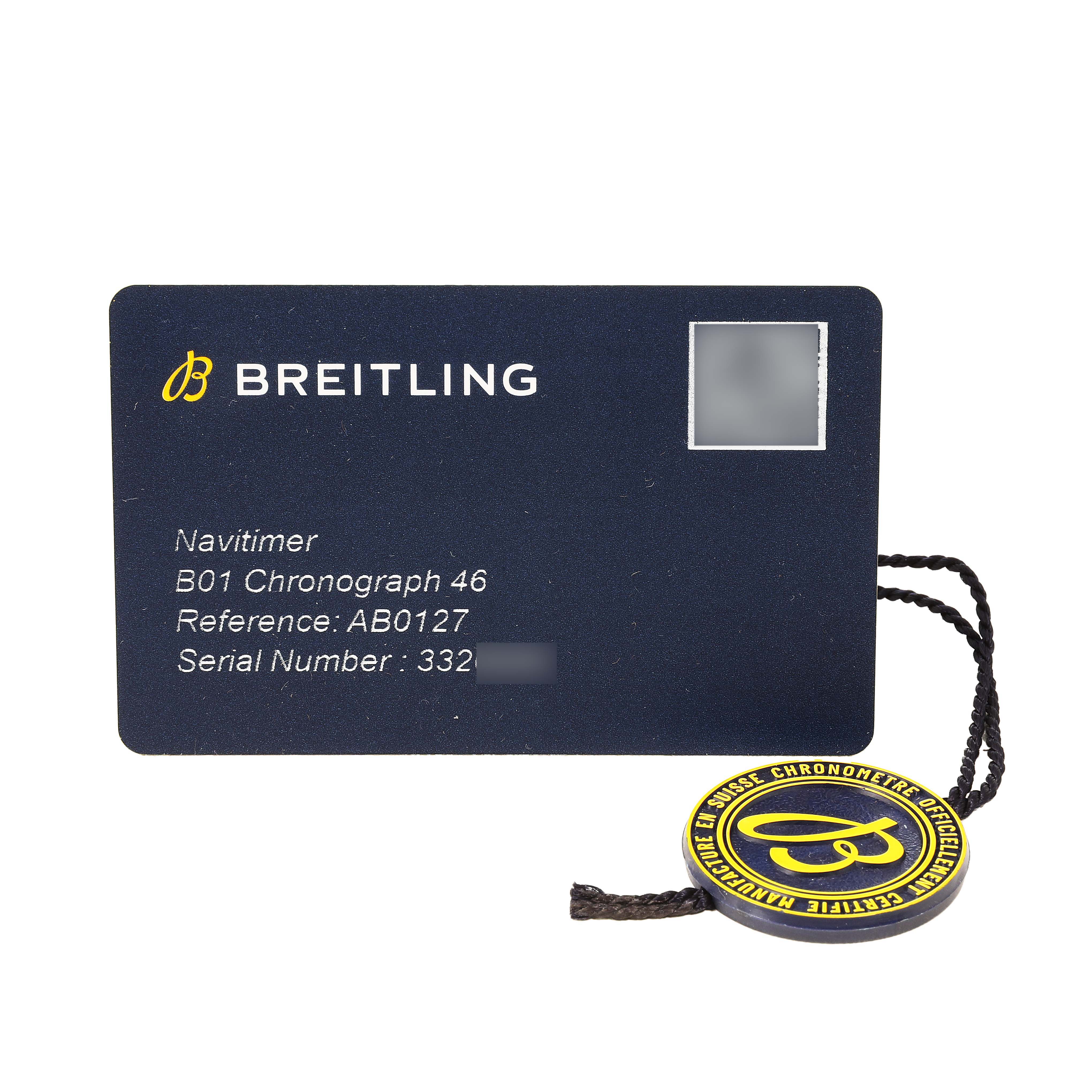 The image shows a Breitling Navitimer AB0127 Men's Stainless Steel Black Dial B01 Chronograph 46 reference card and a circular tag with the brand logo.
