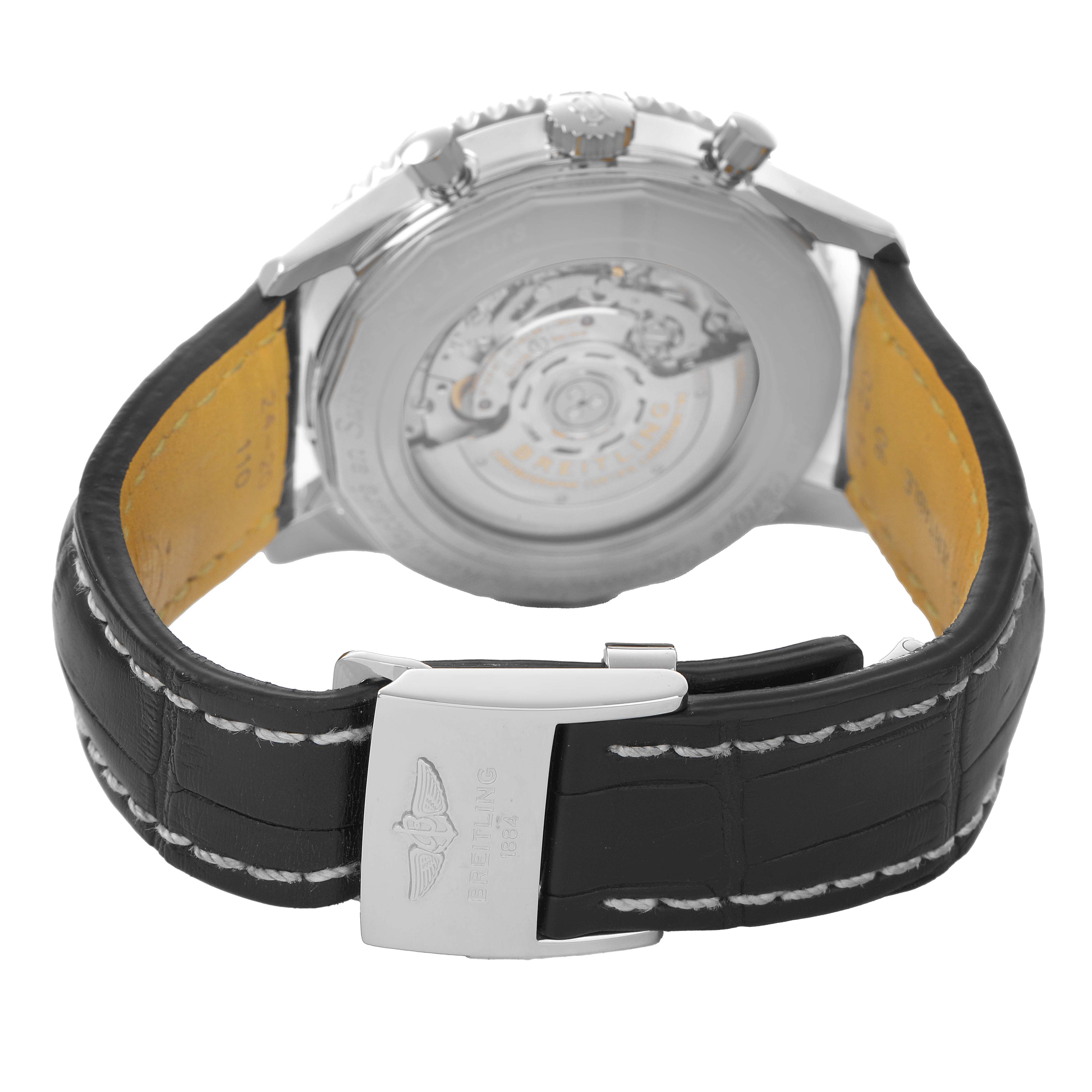 The Breitling Navitimer AB0127 Men's Stainless Steel Black Dial watch is shown from the back, highlighting the open case back and black leather strap with a clasp.