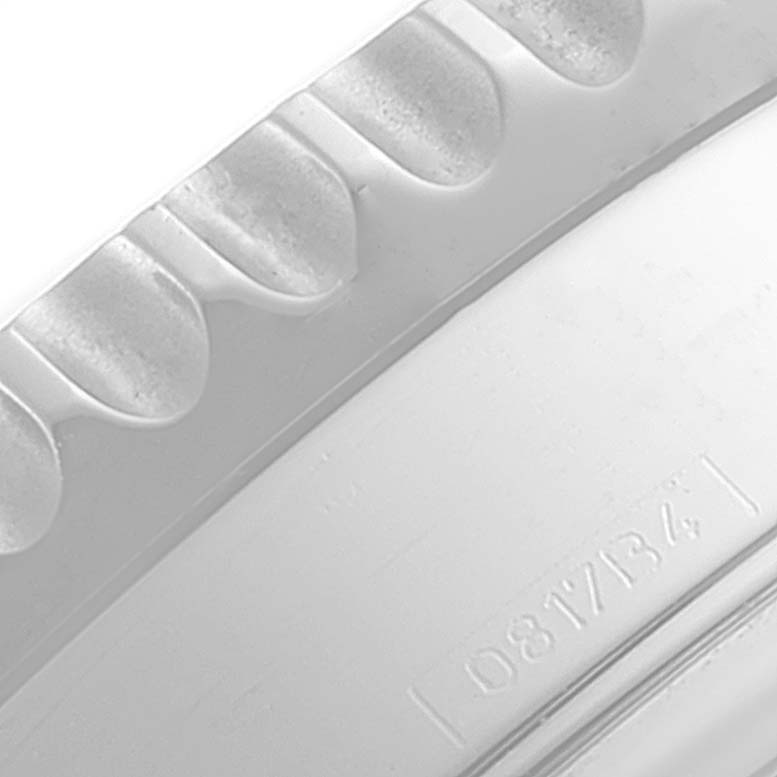 The image shows a close-up of the bezel and casing of a Breitling Navitimer AB0120 Men's Stainless Steel Silver Dial AB0120 Men's Stainless Steel Silver Dial watch.