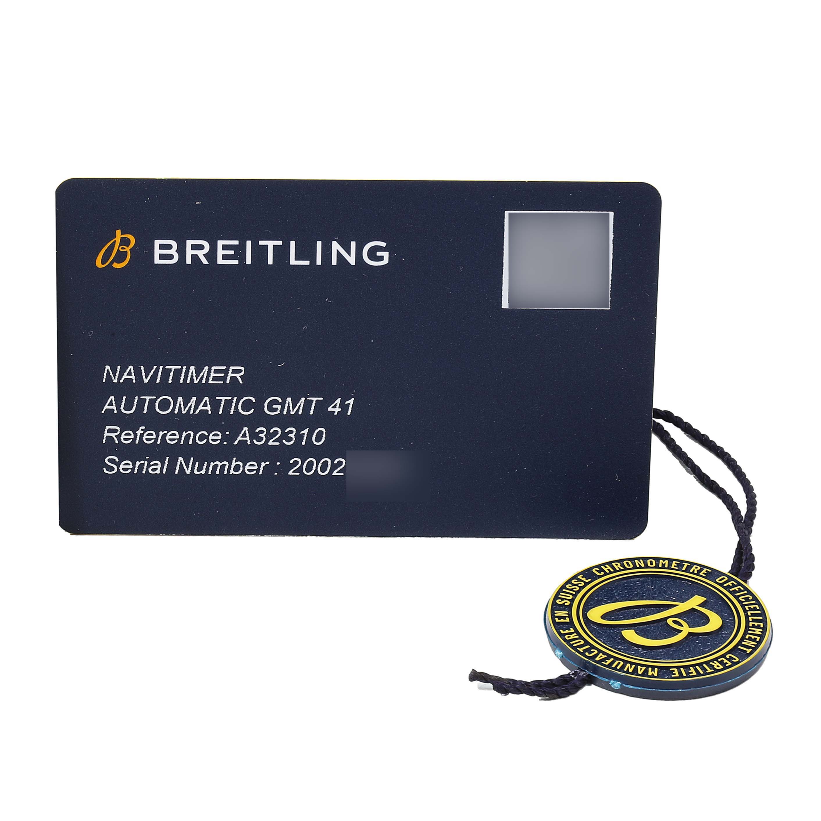 The image shows a warranty card for a Breitling Navitimer A32310 Men's Stainless Steel Silver Dial Automatic GMT 41, featuring brand details and a tag.