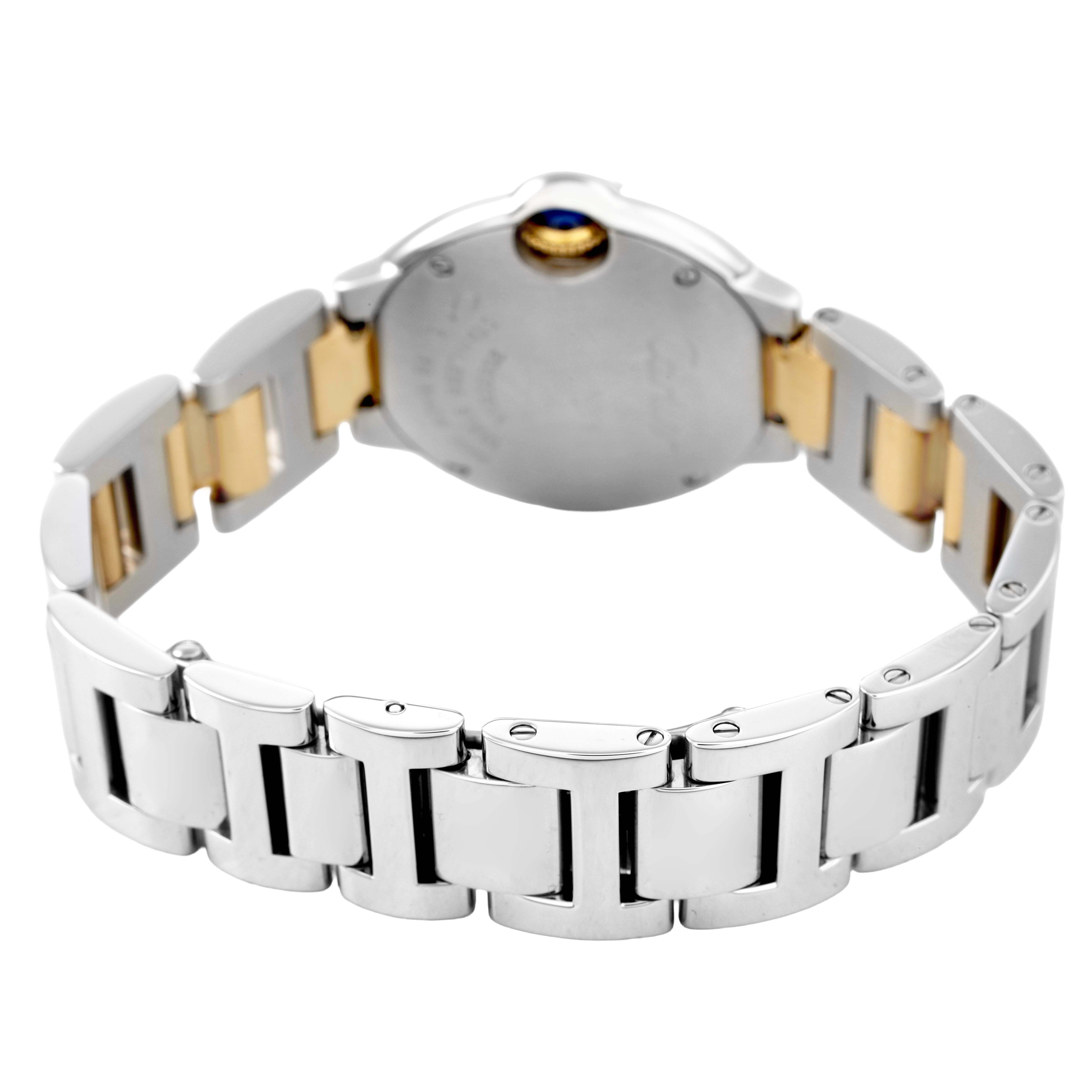 The image shows the back and side of the Ballon Bleu by Cartier, highlighting its two-tone bracelet and case back.