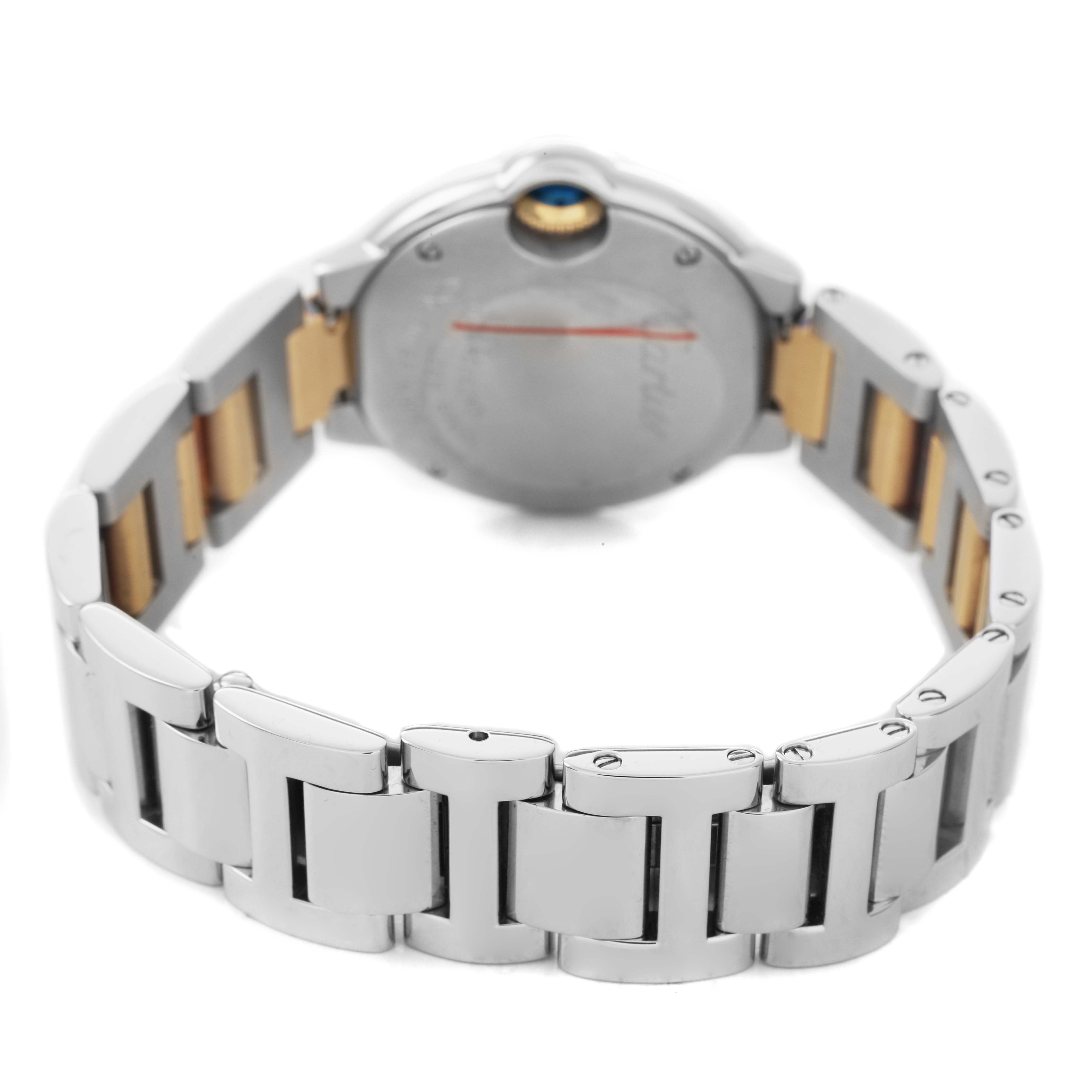 The image shows the back of a Cartier Ballon Bleu W69007Z3 Women's Steel and Gold (two tone) Silver Dial watch, highlighting the metal bracelet and case back.
