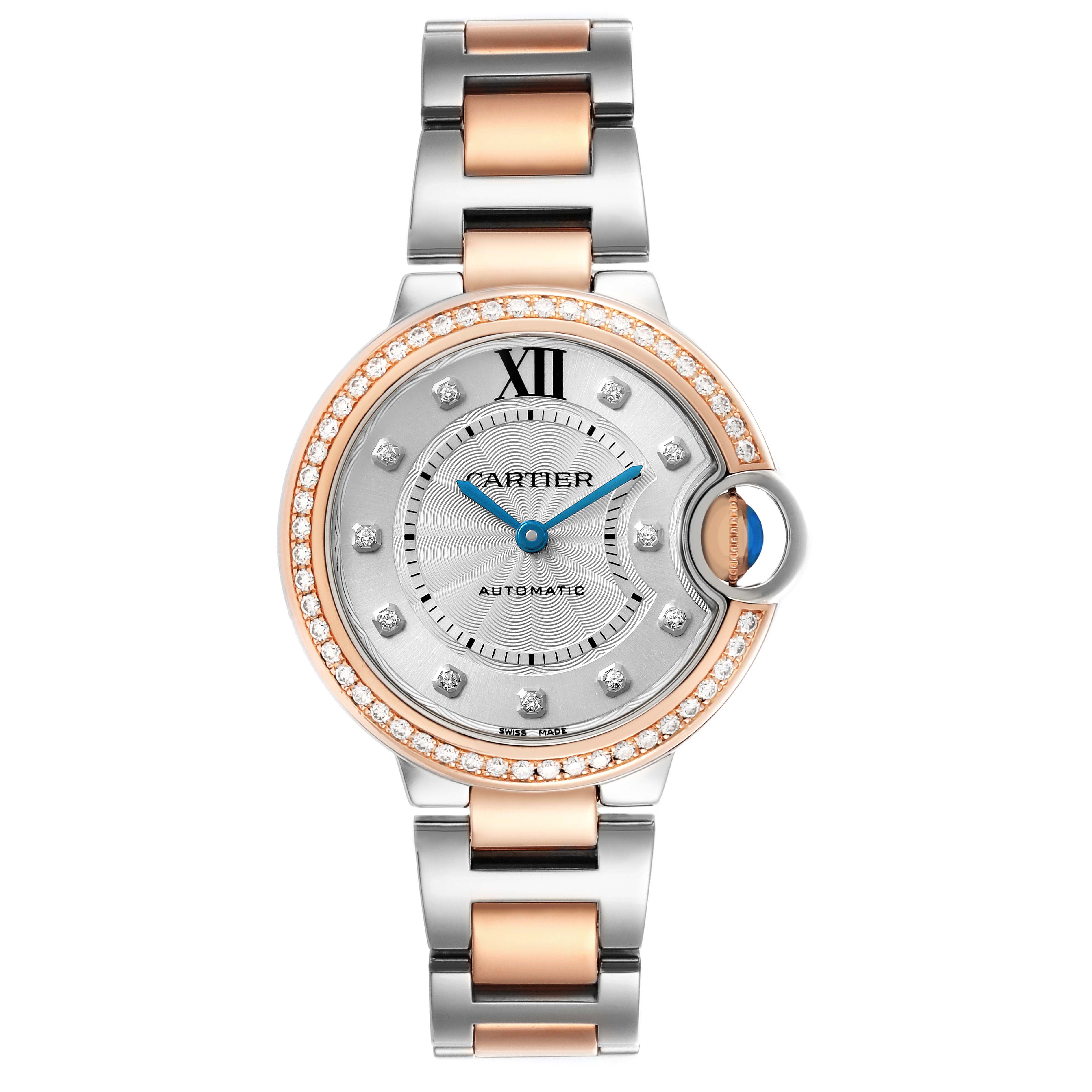 The Cartier Ballon Bleu WE902077 Women's Steel and Gold (two tone) Silver Dial watch is shown from a front view, showcasing the face, crown, and two-tone bracelet.