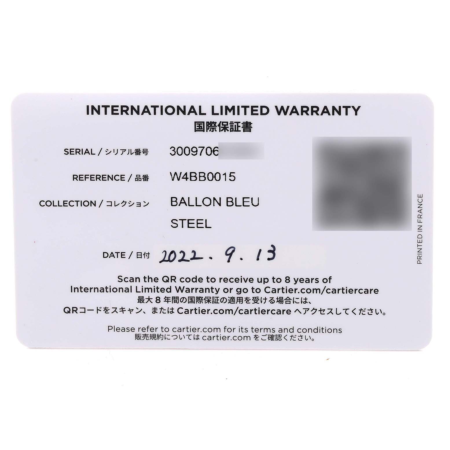 The image shows an international limited warranty card for the Ballon Bleu model by Cartier, captured from a top view.