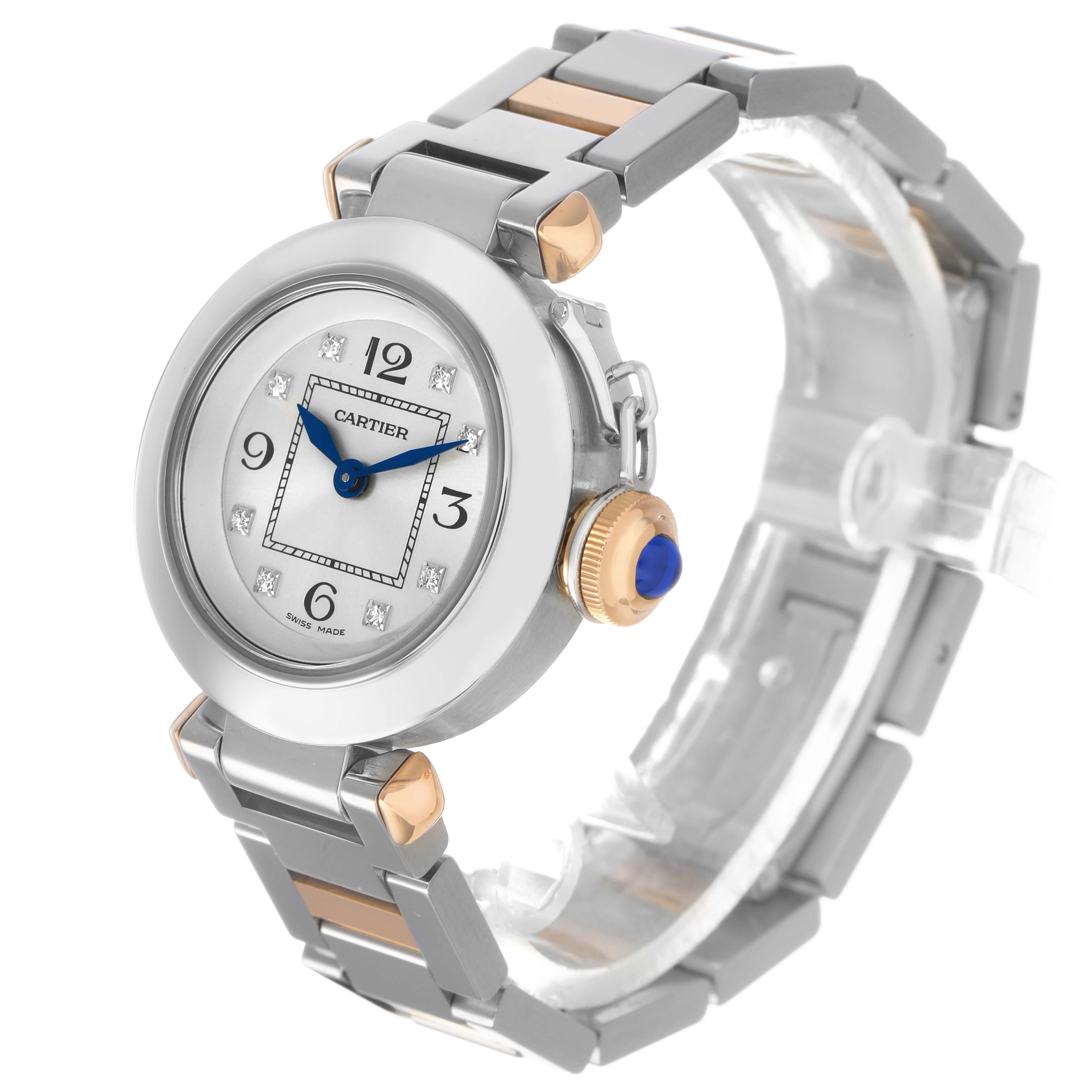 The Cartier Pasha WJ124020 Women's Steel and Gold (two tone) Silver Dial watch is shown at an angled view, highlighting the face, crown, and part of the bracelet.