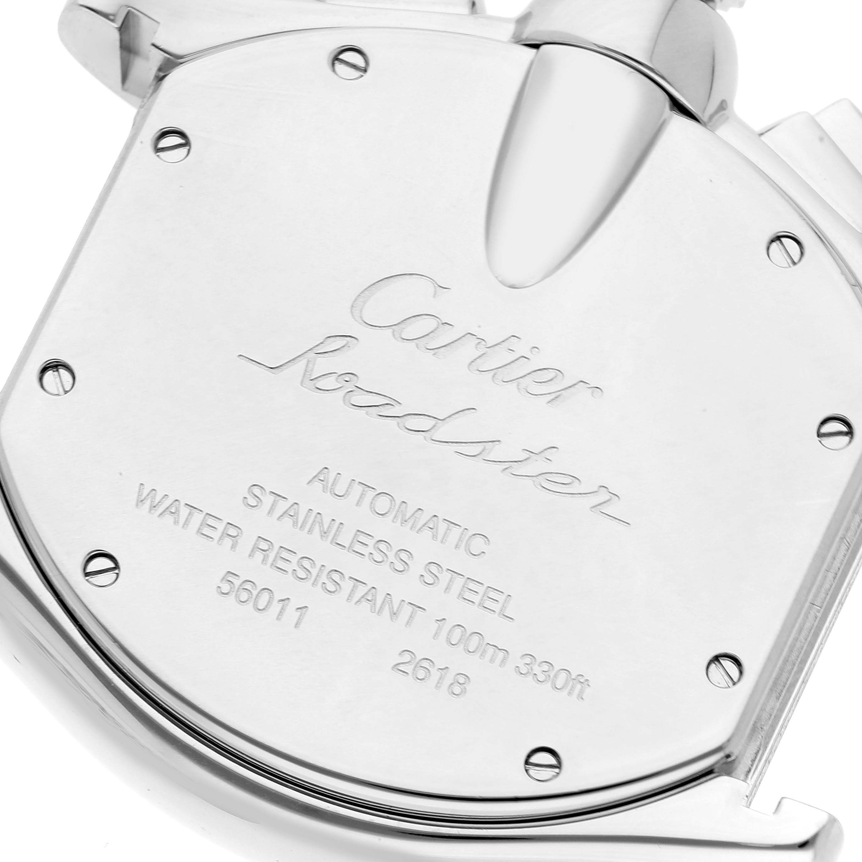 The image shows the back side of a Cartier Roadster W62019X6 Men's Stainless Steel Silver Dial W62019X6 Men's Stainless Steel Silver Dial watch, highlighting engravings and screws.