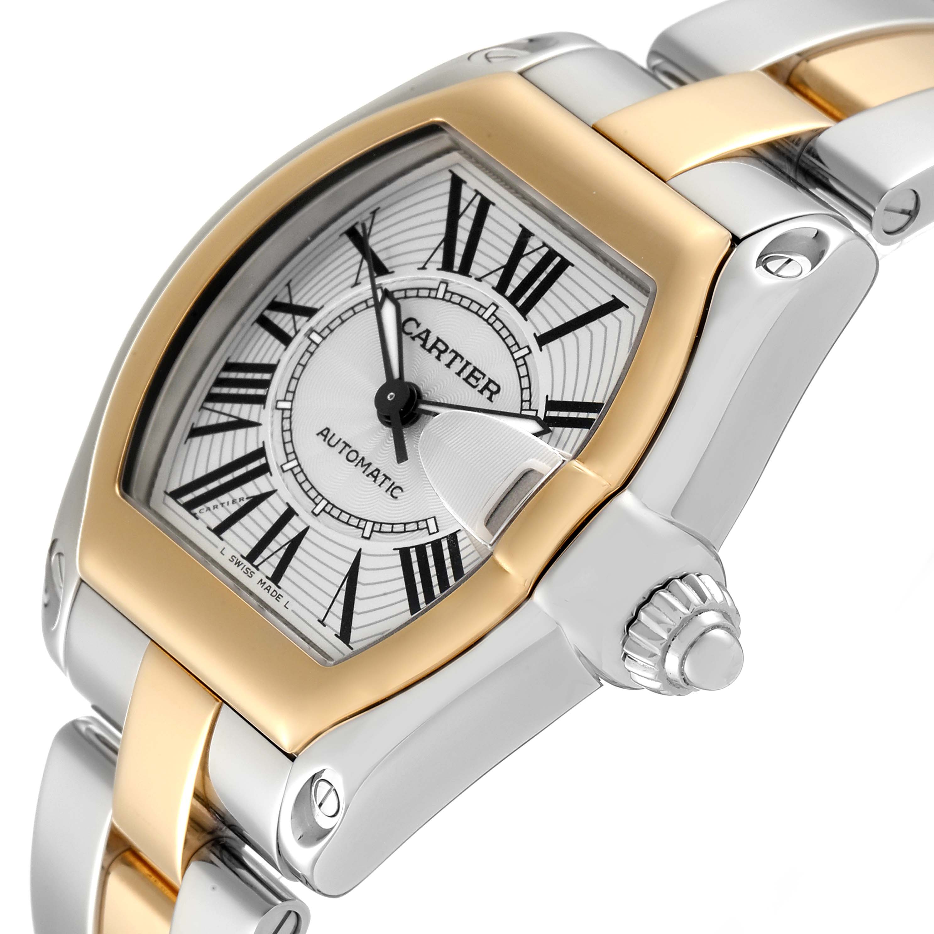 The image shows a close-up angle of the dial, bezel, and crown of the Cartier Roadster W62031Y4 Men's Steel and Gold (two tone) Silver Dial W62031Y4 Men's Steel and Gold (two tone) Silver Dial watch.
