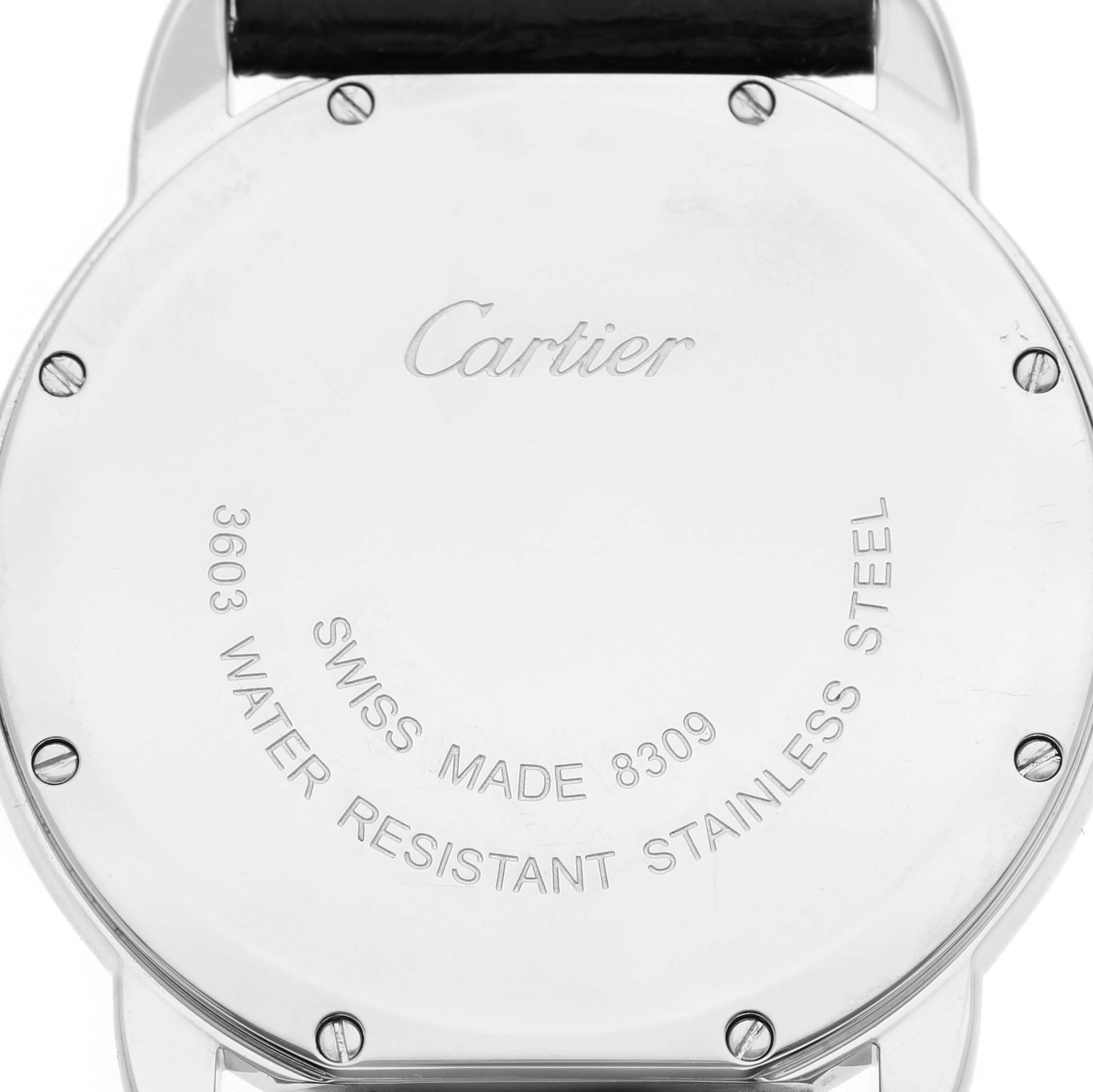 The image shows the back of a Cartier Ronde W6700255 Men's Stainless Steel Silver Dial watch, displaying the brand name and specifications engraved on the case.