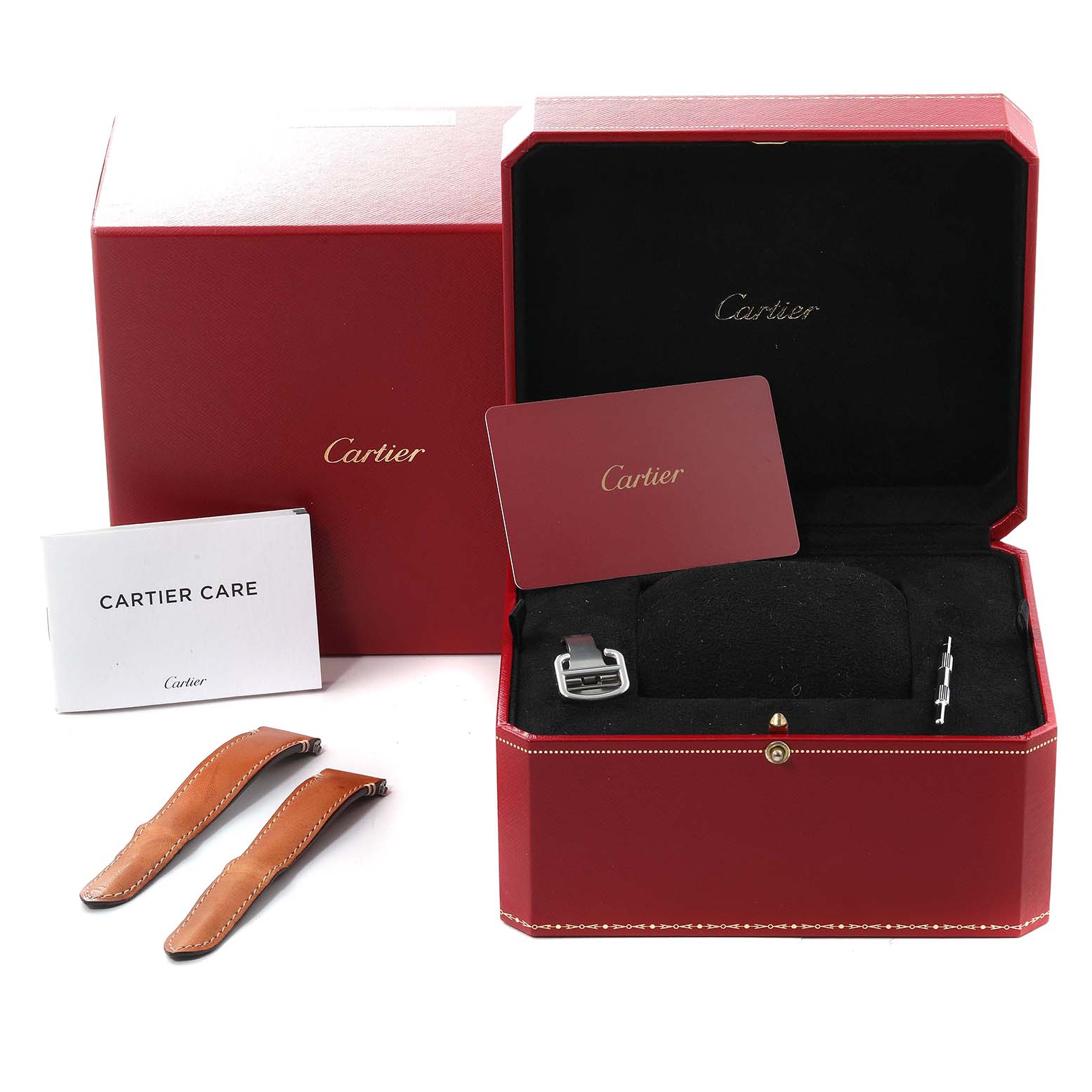 The image shows a Cartier Santos WSSA0010 Men's Stainless Steel Silver Dial WSSA0010 Men's Stainless Steel Silver Dial watch box, additional leather straps, and Cartier Care booklets from a front angle.