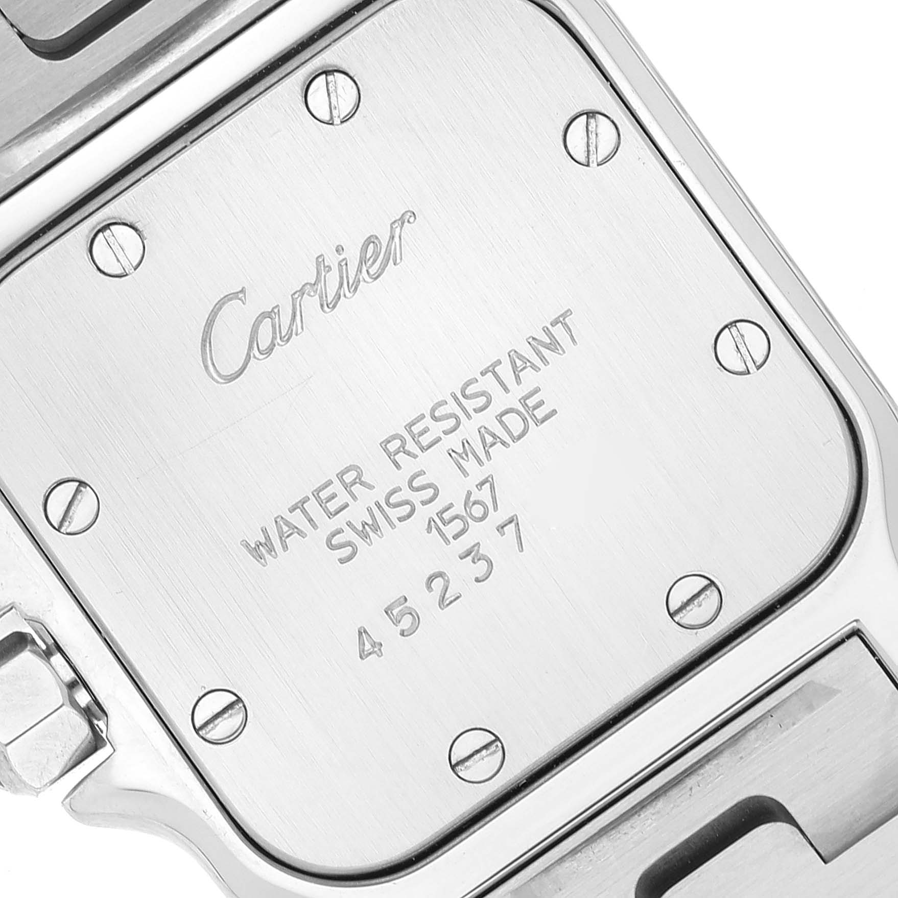 This image shows the back case of the Cartier Santos W20012C4 Women's Steel and Gold (two tone) Silver Dial W20012C4 Women's Steel and Gold (two tone) Silver Dial watch, highlighting its screws and engraved information.