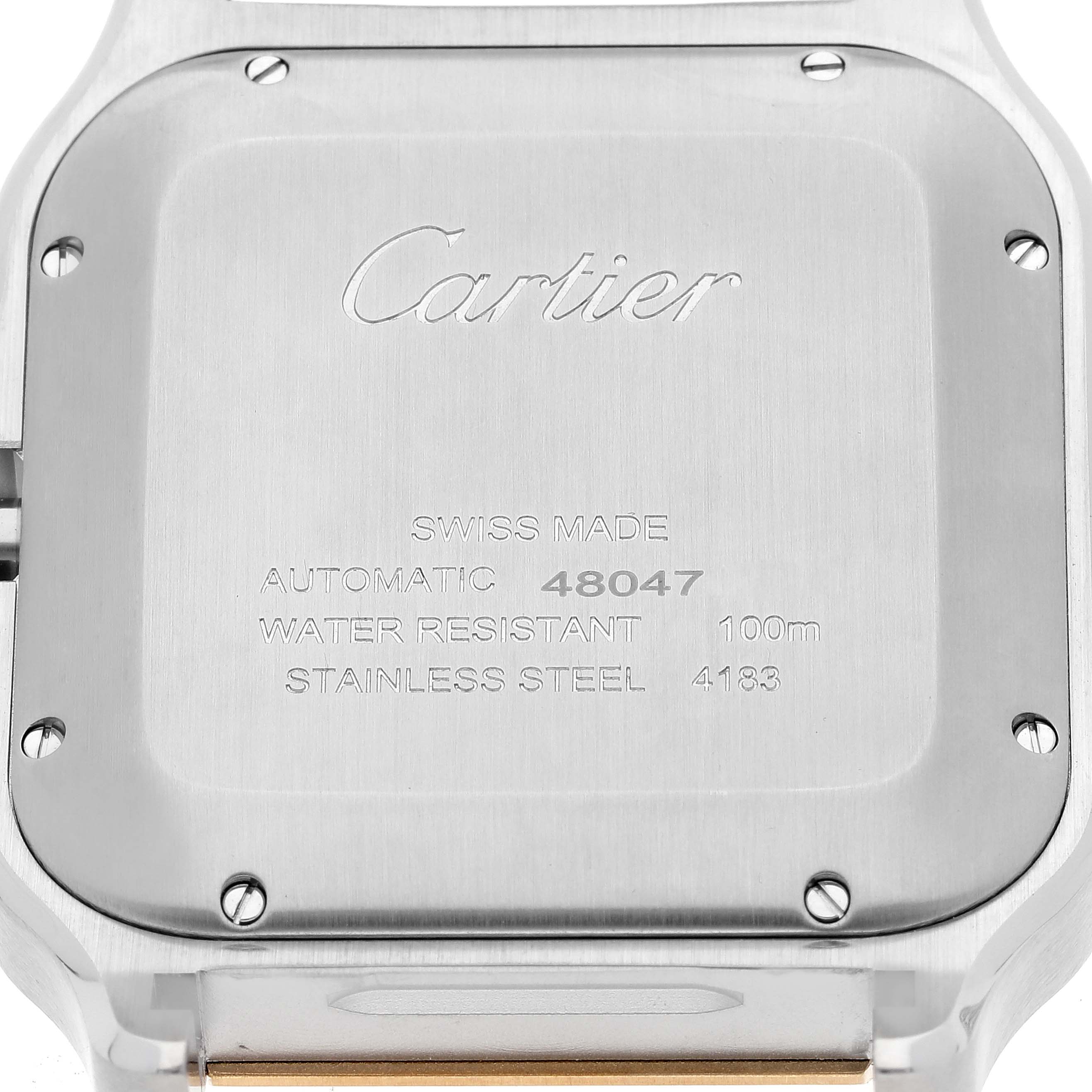 This is a close-up of the back of a Santos model by Cartier, showing its engraved details and screws.