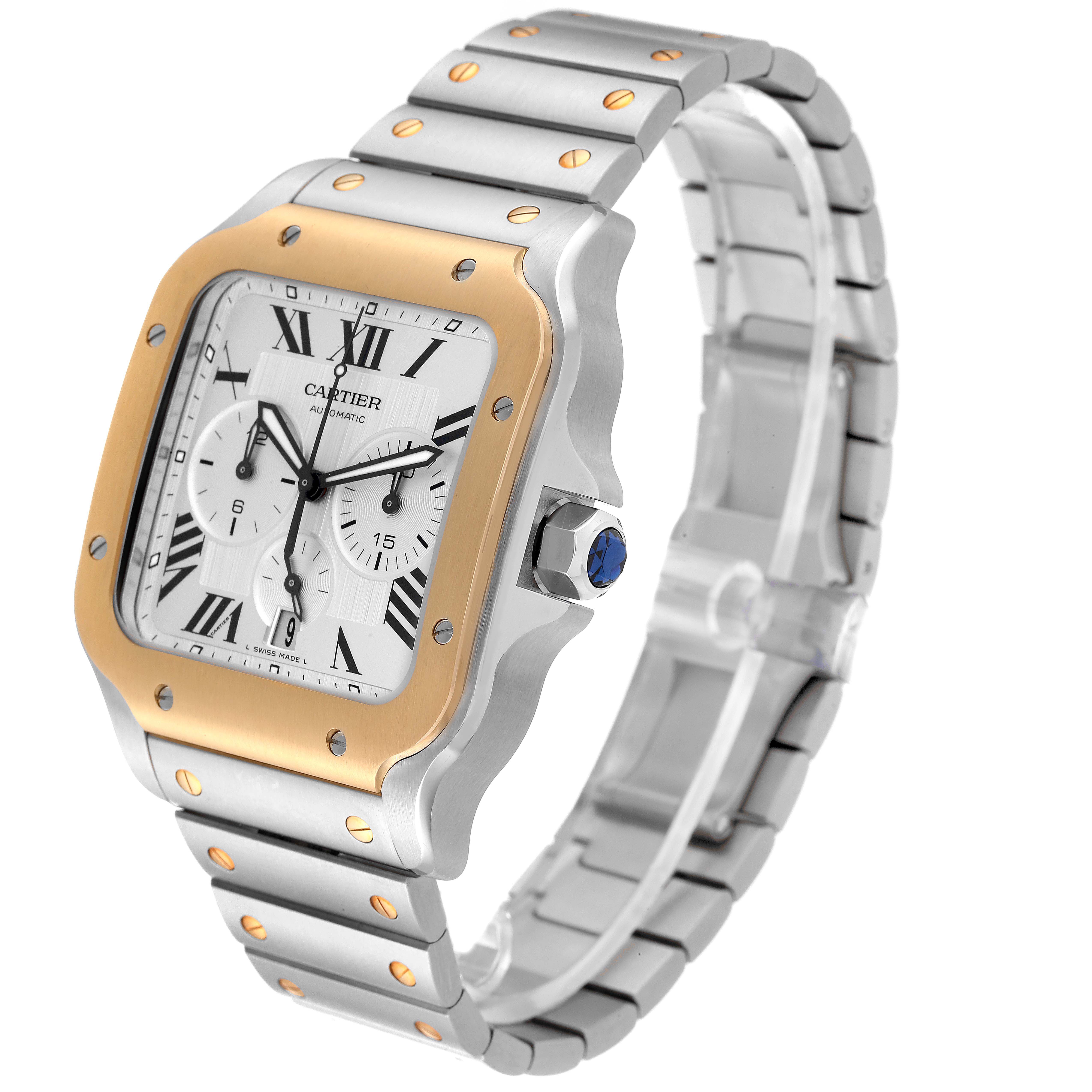 The Cartier Santos W2SA0008 Men's Steel and Gold (two tone) Silver Dial W2SA0008 Men's Steel and Gold (two tone) Silver Dial watch is shown at a slight angle, highlighting its bezel, dial, crown with a blue gem, and metal bracelet.