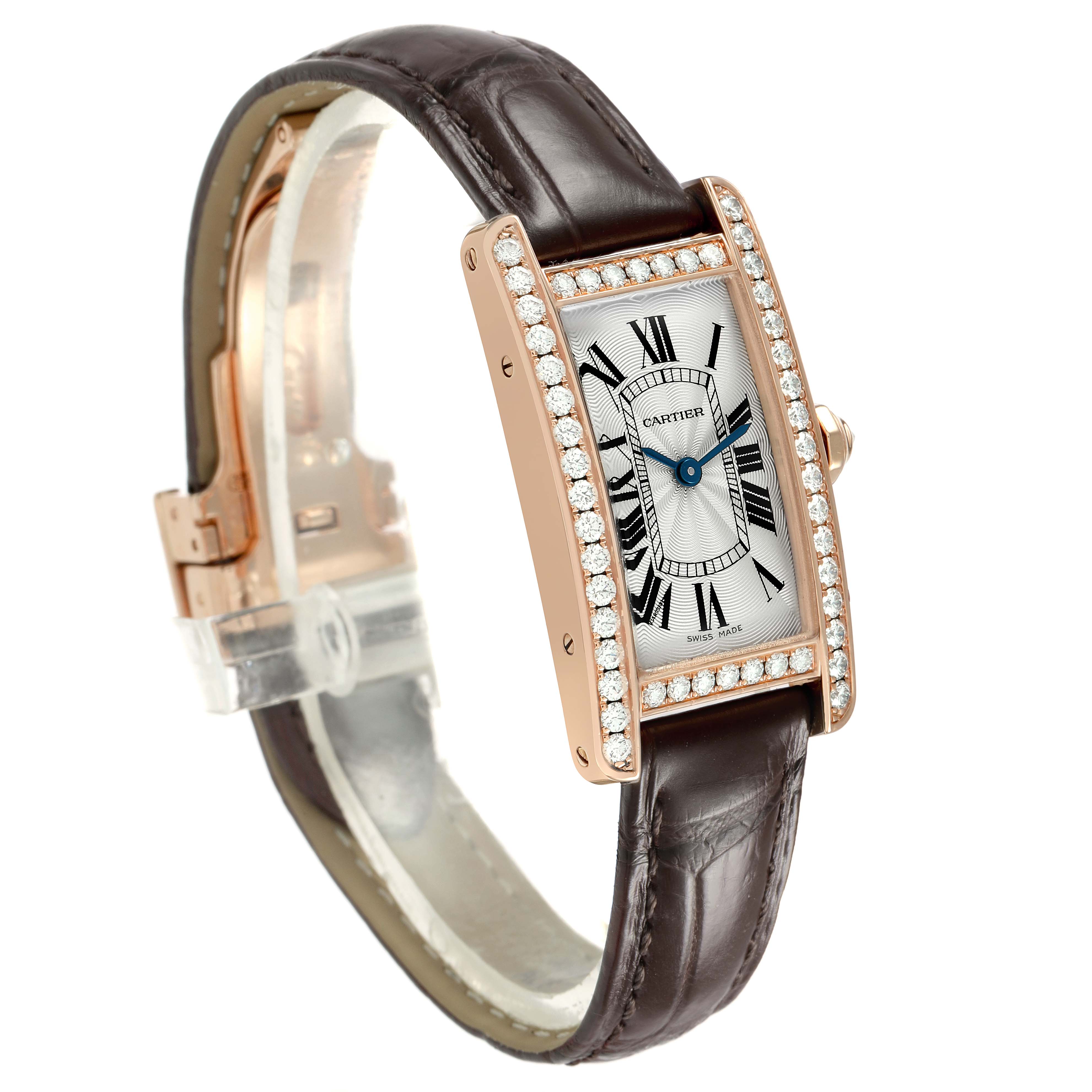The Cartier Tank Americaine WJTA0002 Women's Rose Gold Silver Dial watch is angled to show the face, bezel with diamonds, and leather strap.