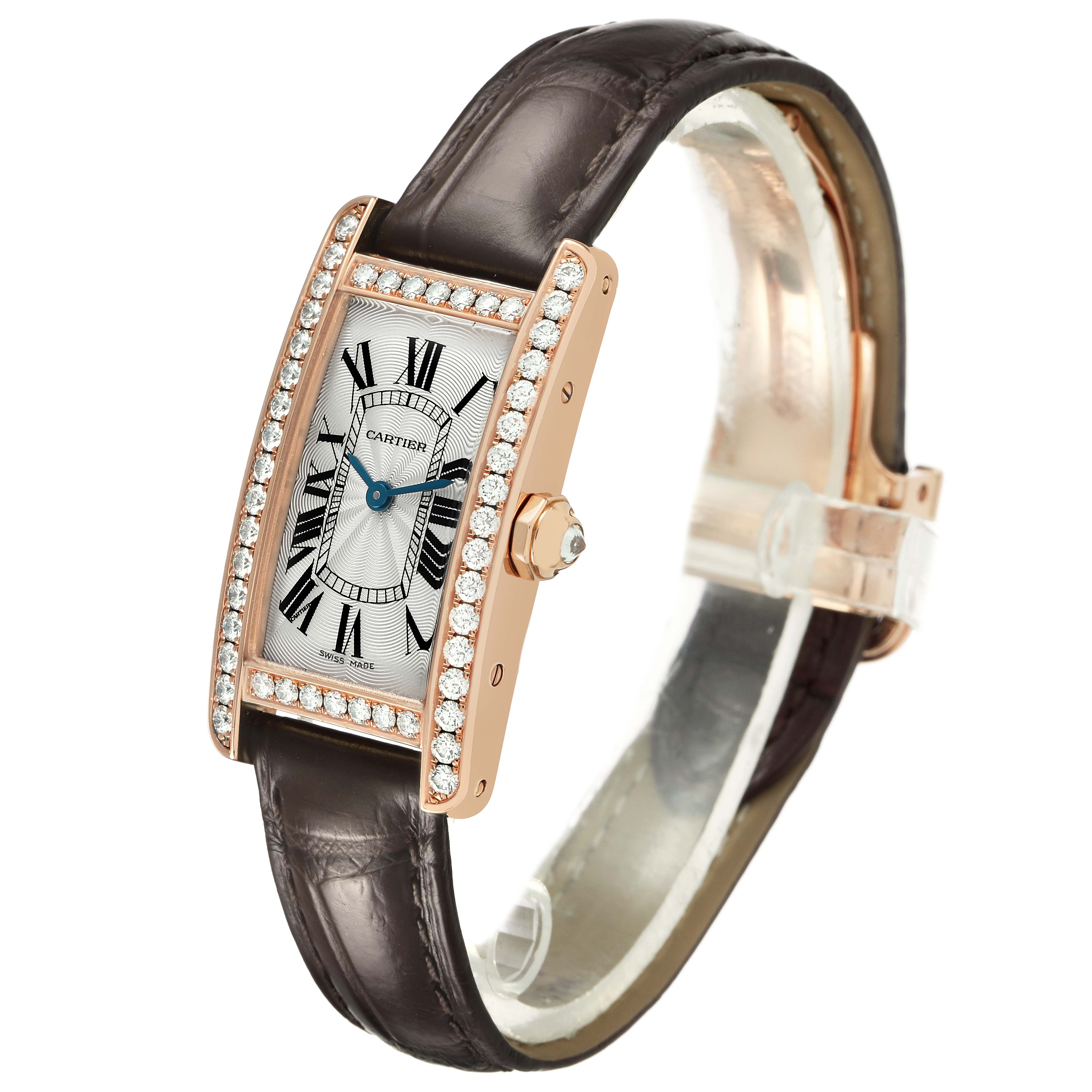 The Cartier Tank Américaine watch is shown in a slight angle, displaying the face, diamond-set bezel, and leather strap.