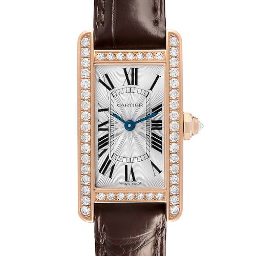 The Cartier Tank Américaine watch is shown from the front, highlighting its rectangular case, diamond bezel, and leather strap.