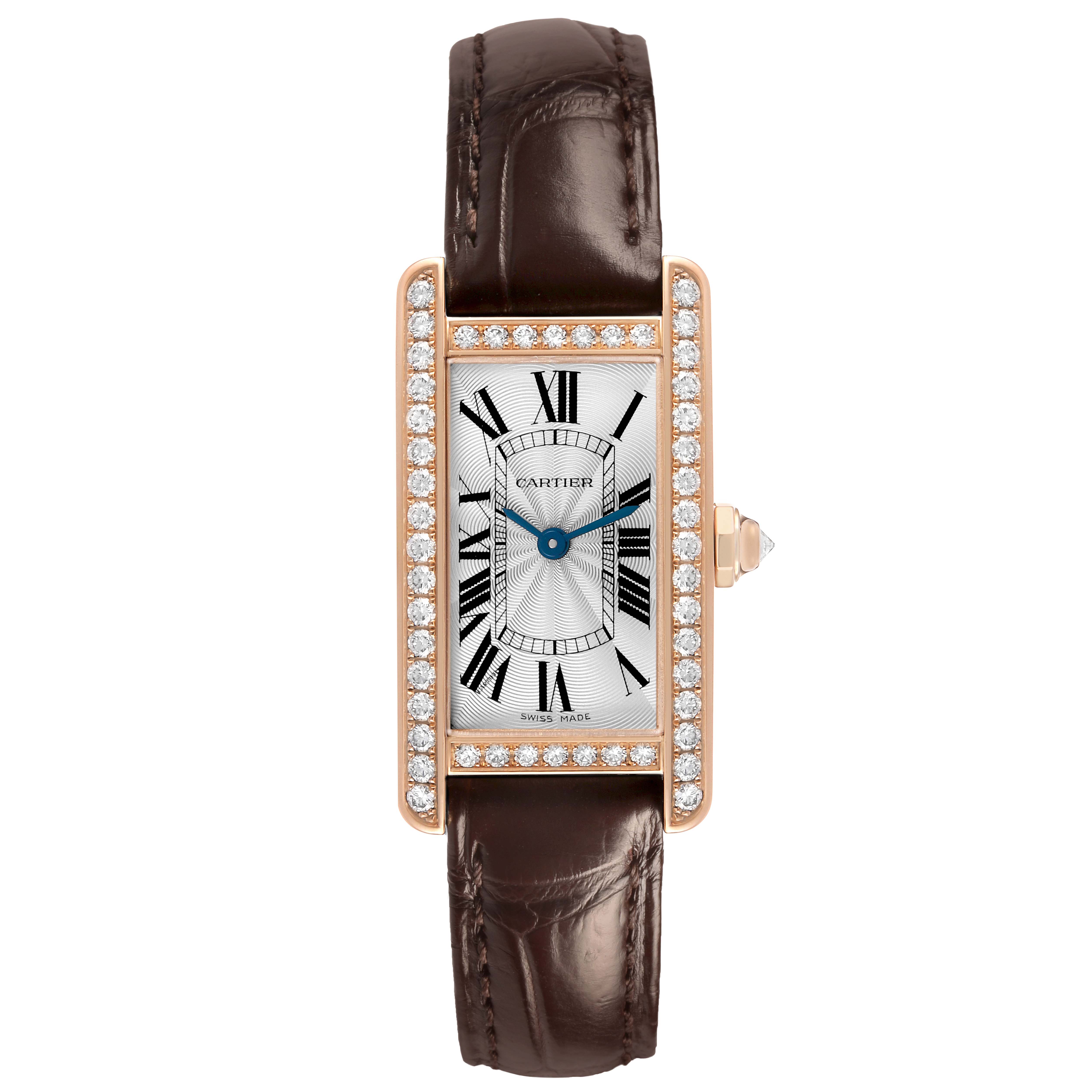 The Cartier Tank Americaine WJTA0002 Women's Rose Gold Silver Dial watch is shown from a front angle, highlighting its diamond-set bezel, Roman numeral dial, and brown leather strap.