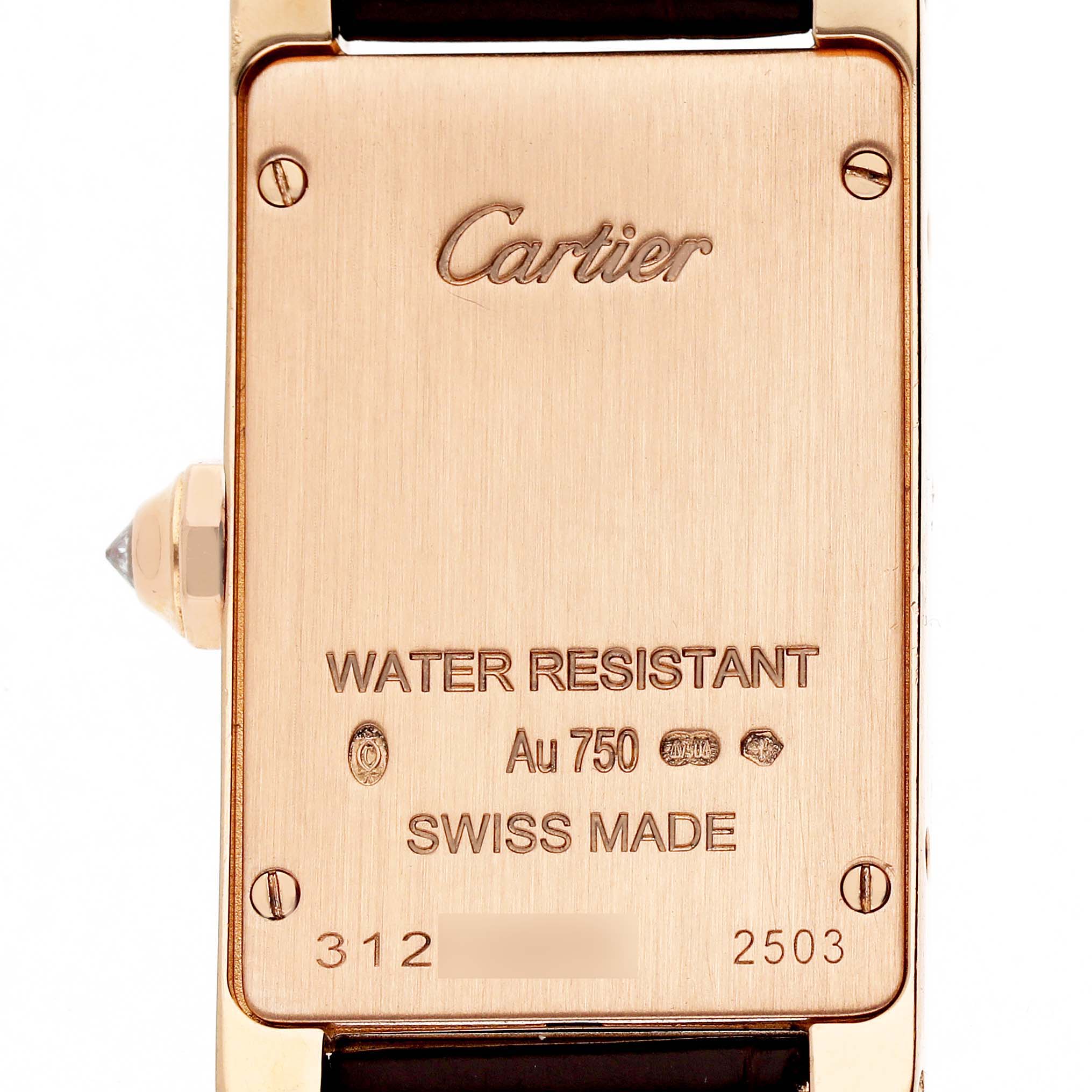 The image shows the back of the Cartier Tank Americaine WJTA0002 Women's Rose Gold Silver Dial, highlighting details like water resistance and material markings.