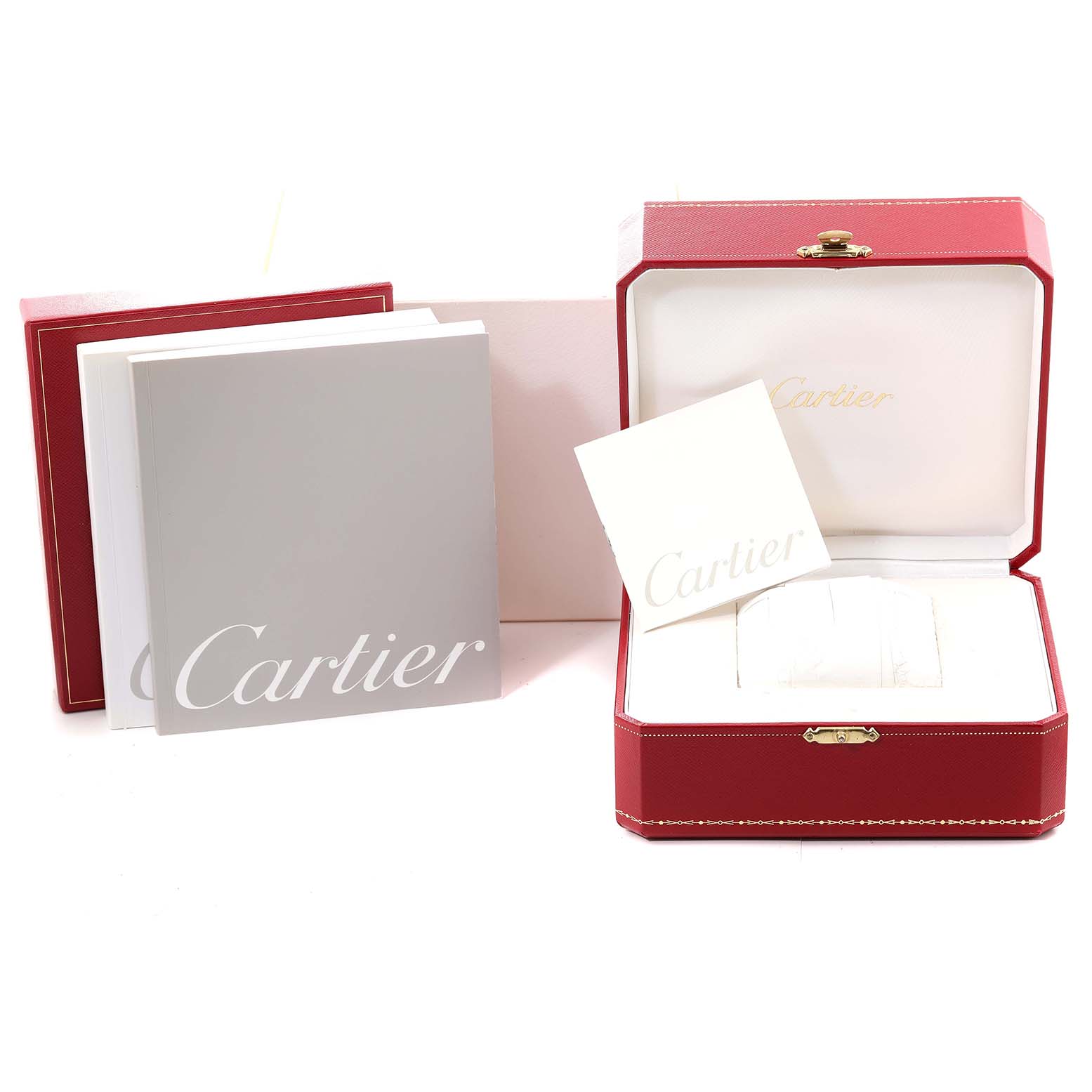 The image shows the packaging and booklets for the Cartier Tank Francaise W51031Q3 Women's Stainless Steel Silver Dial W51031Q3 Women's Stainless Steel Silver Dial watch, featuring an open red box and Cartier manuals.