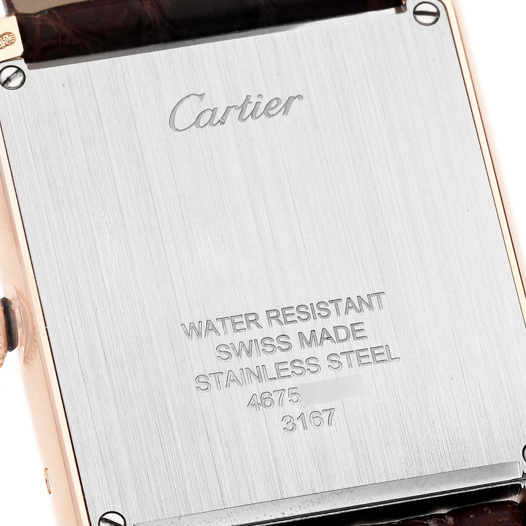 This image shows the case back of a Cartier Tank Solo W5200025 Men's Rose Gold Silver Dial W5200025 Men's Rose Gold Silver Dial watch, highlighting its engravings and stainless steel finish.