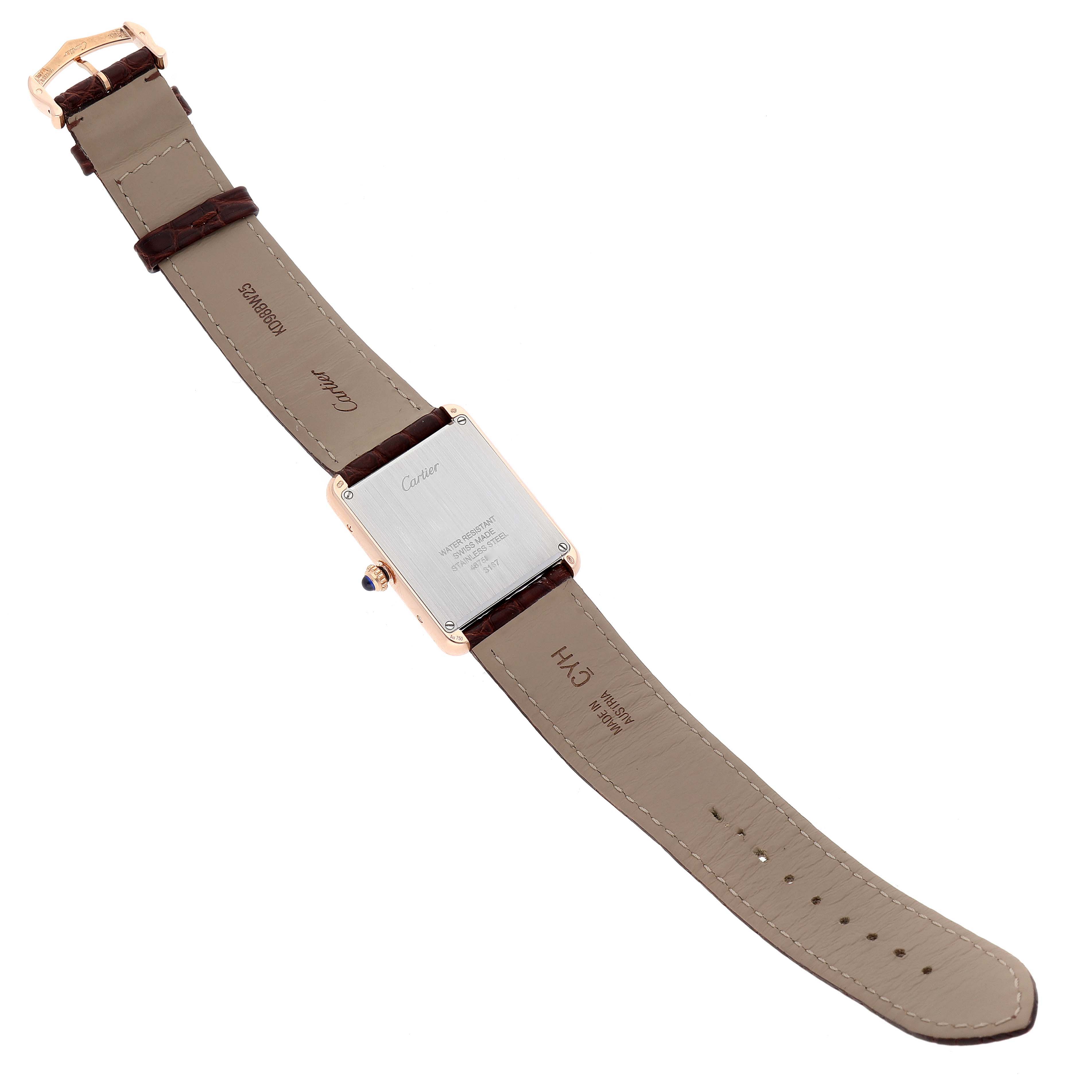 The image shows the back and strap of a Cartier Tank Solo W5200025 Men's Rose Gold Silver Dial W5200025 Men's Rose Gold Silver Dial watch laying flat.