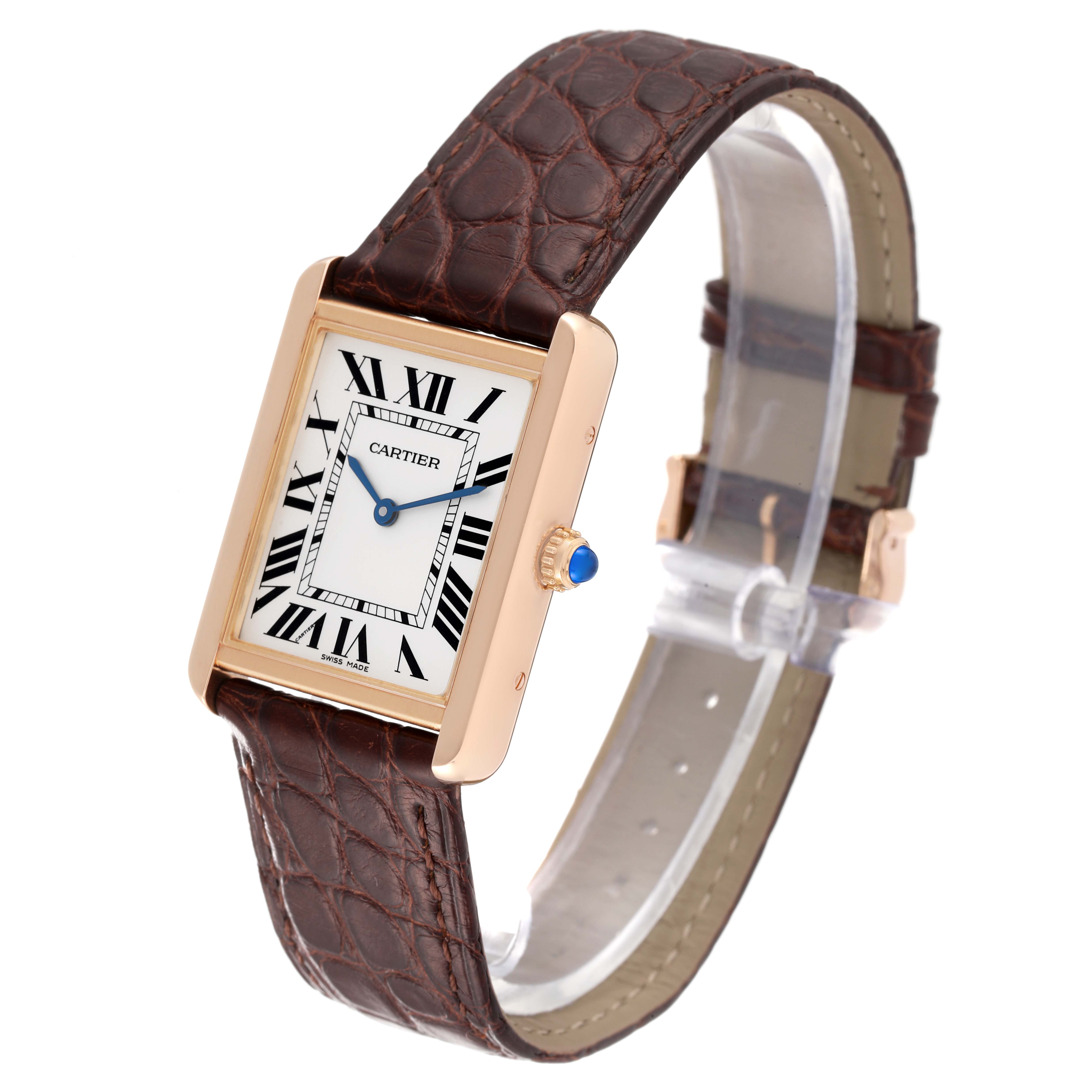 The Cartier Tank Solo W5200025 Men's Rose Gold Silver Dial W5200025 Men's Rose Gold Silver Dial watch is shown at a slight angle, highlighting the Roman numeral dial, gold case, brown leather strap, and blue beaded crown.