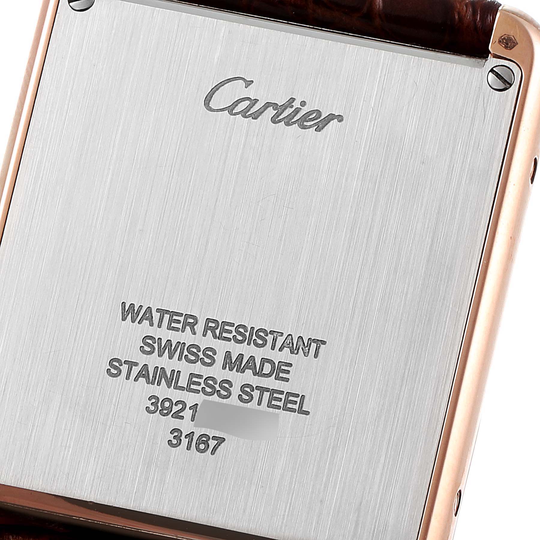 This image shows the back case of a Cartier Tank Solo W5200025 Men's Rose Gold Silver Dial W5200025 Men's Rose Gold Silver Dial watch, highlighting its engravings and materials.