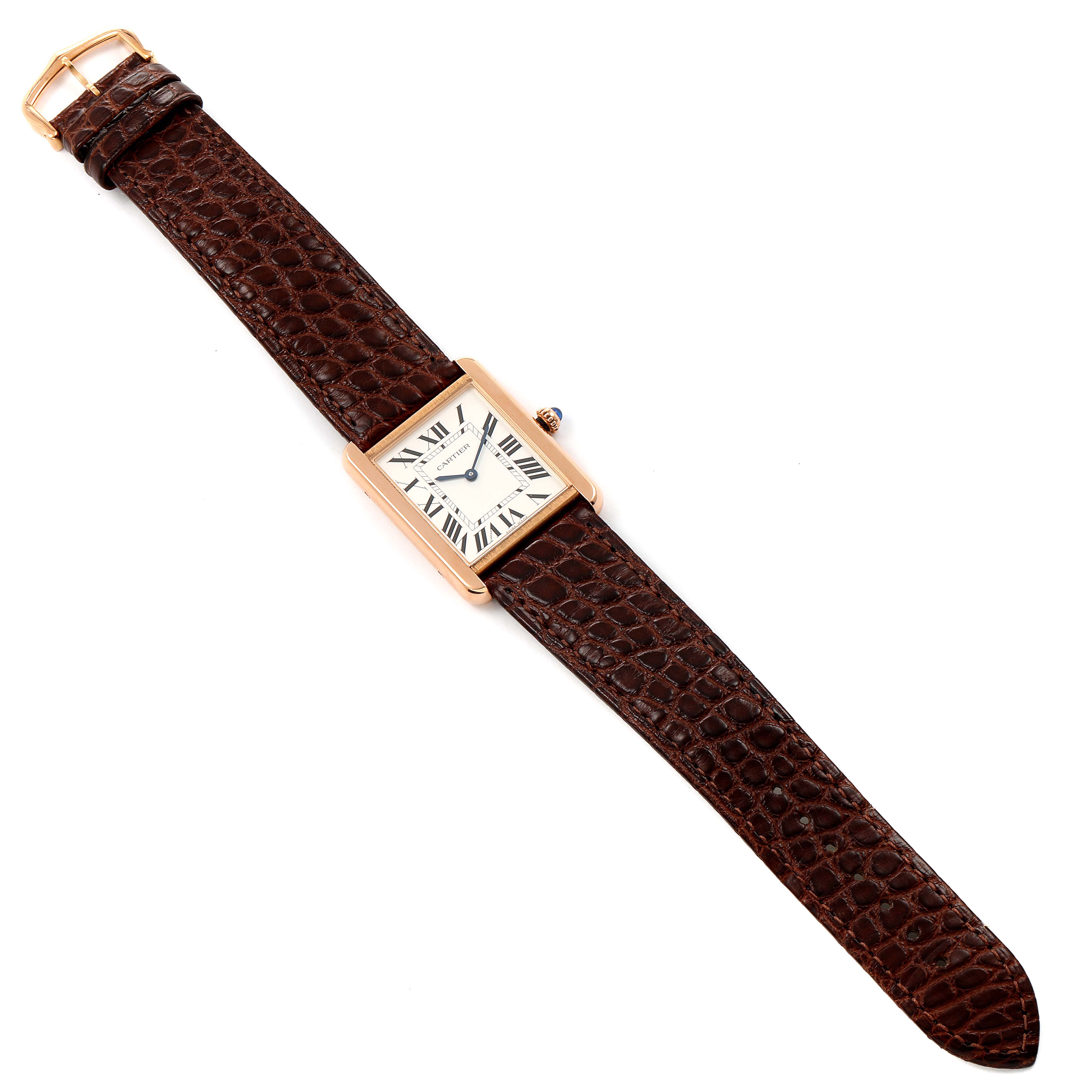 The Cartier Tank Solo W5200025 Men's Rose Gold Silver Dial W5200025 Men's Rose Gold Silver Dial watch is shown from a top-down angle, displaying its rectangular face and brown leather strap.