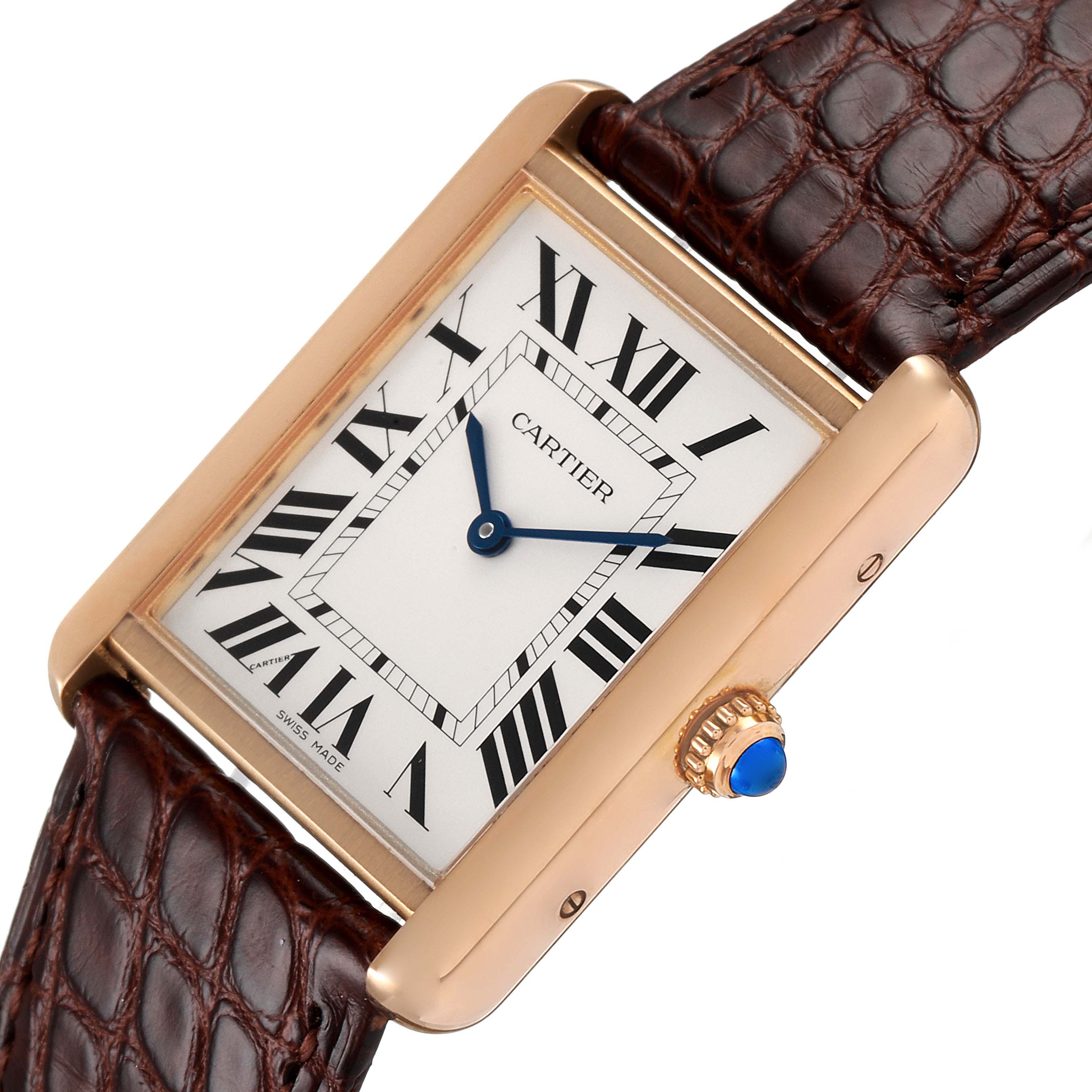 This image shows a Cartier Tank Solo W5200025 Men's Rose Gold Silver Dial W5200025 Men's Rose Gold Silver Dial watch from a top angle, highlighting the face, crown, and part of the leather strap.