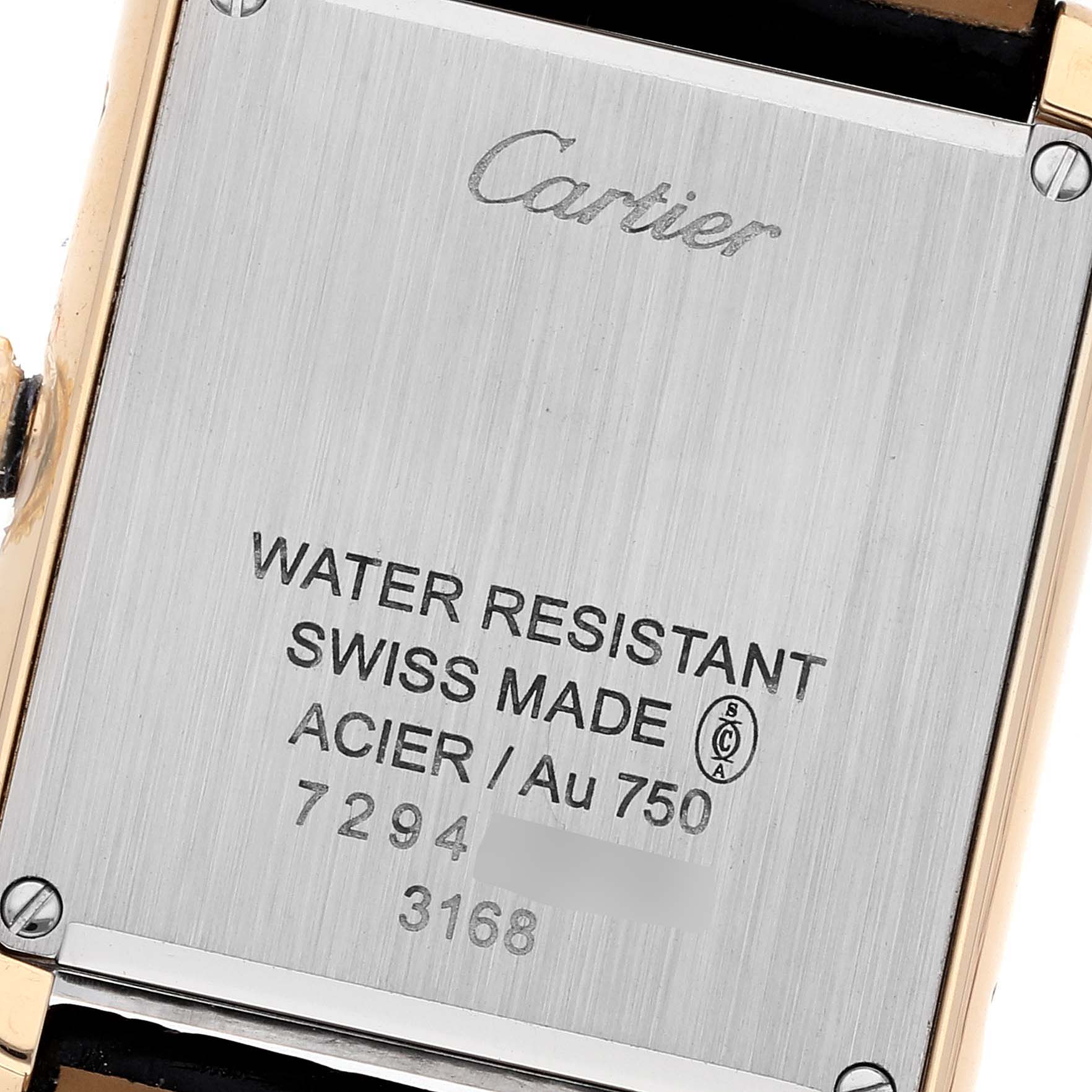 This image shows the back case of the Tank Solo model watch by Cartier, displaying its specifications and markings.