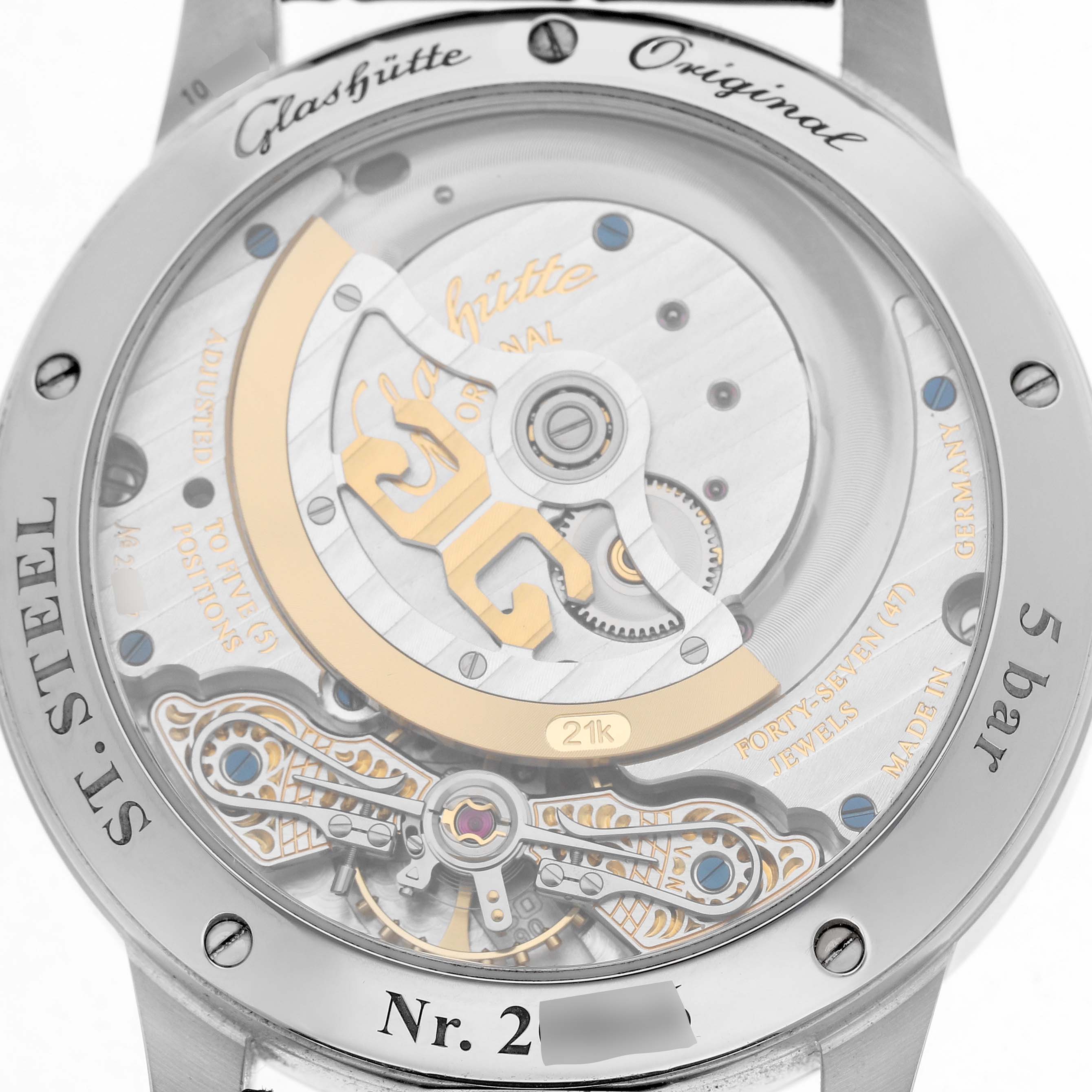 The image shows the back of a Glashütte Original Pano model, highlighting the detailed movement and rotor.