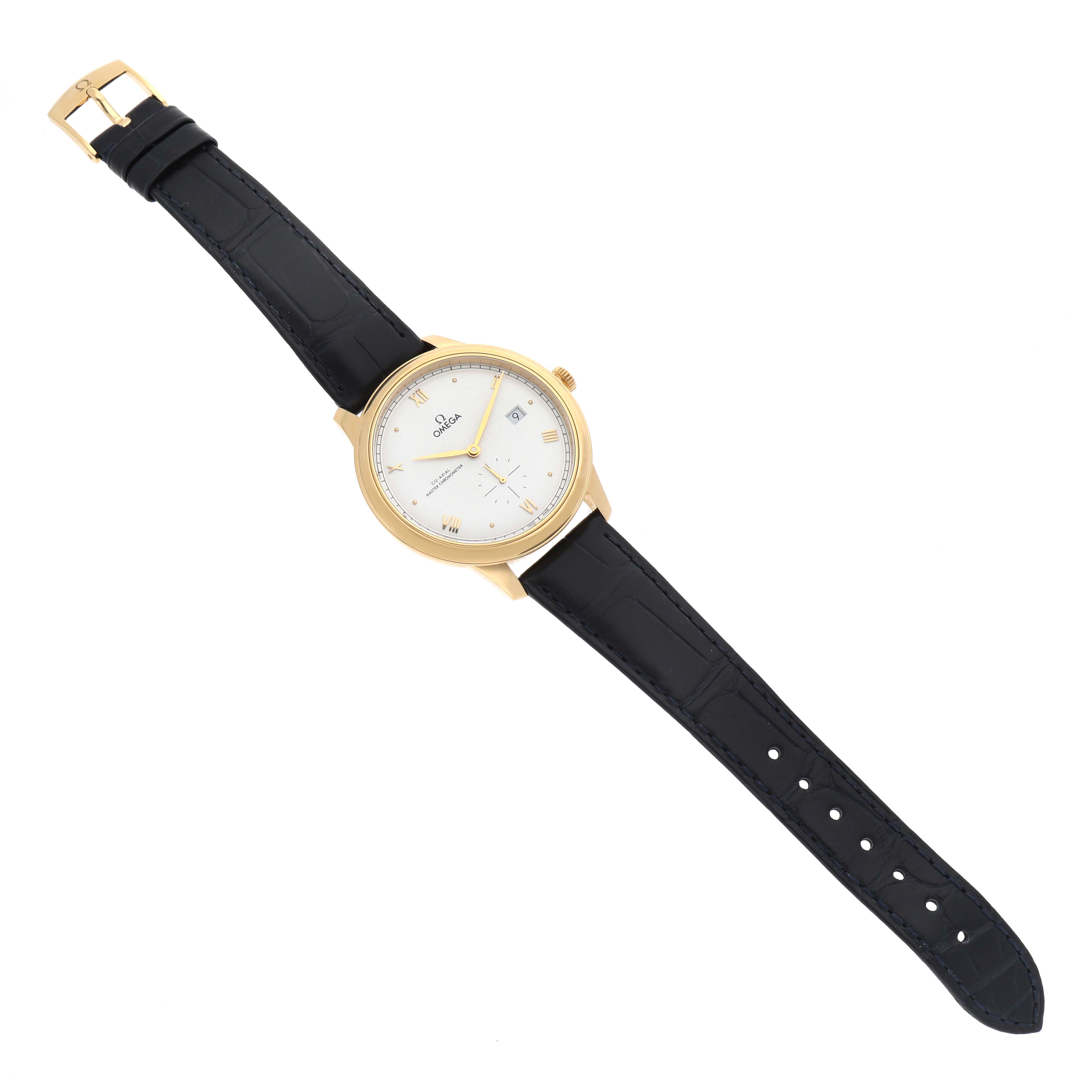 The Omega De Ville 434.53.41.20.02.001 Men's Yellow Gold Silver Dial watch is shown from a top-down angle, displaying its face, gold case, and black strap.