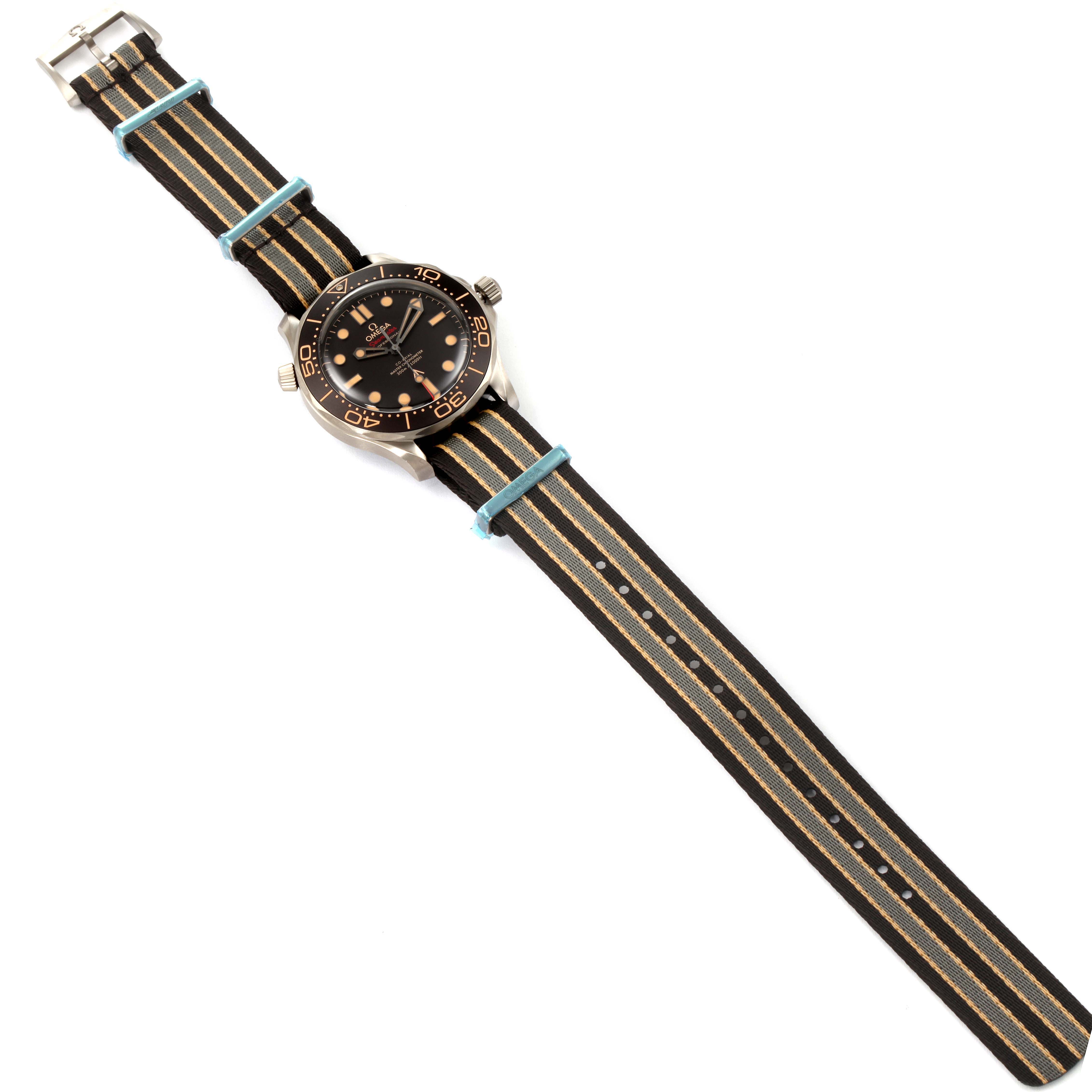 The image shows an Omega Seamaster 210.92.42.20.01.001 Men's Titanium Brown Dial 210.92.42.20.01.001 Men's Titanium Brown Dial watch with a striped NATO strap, viewed from above.