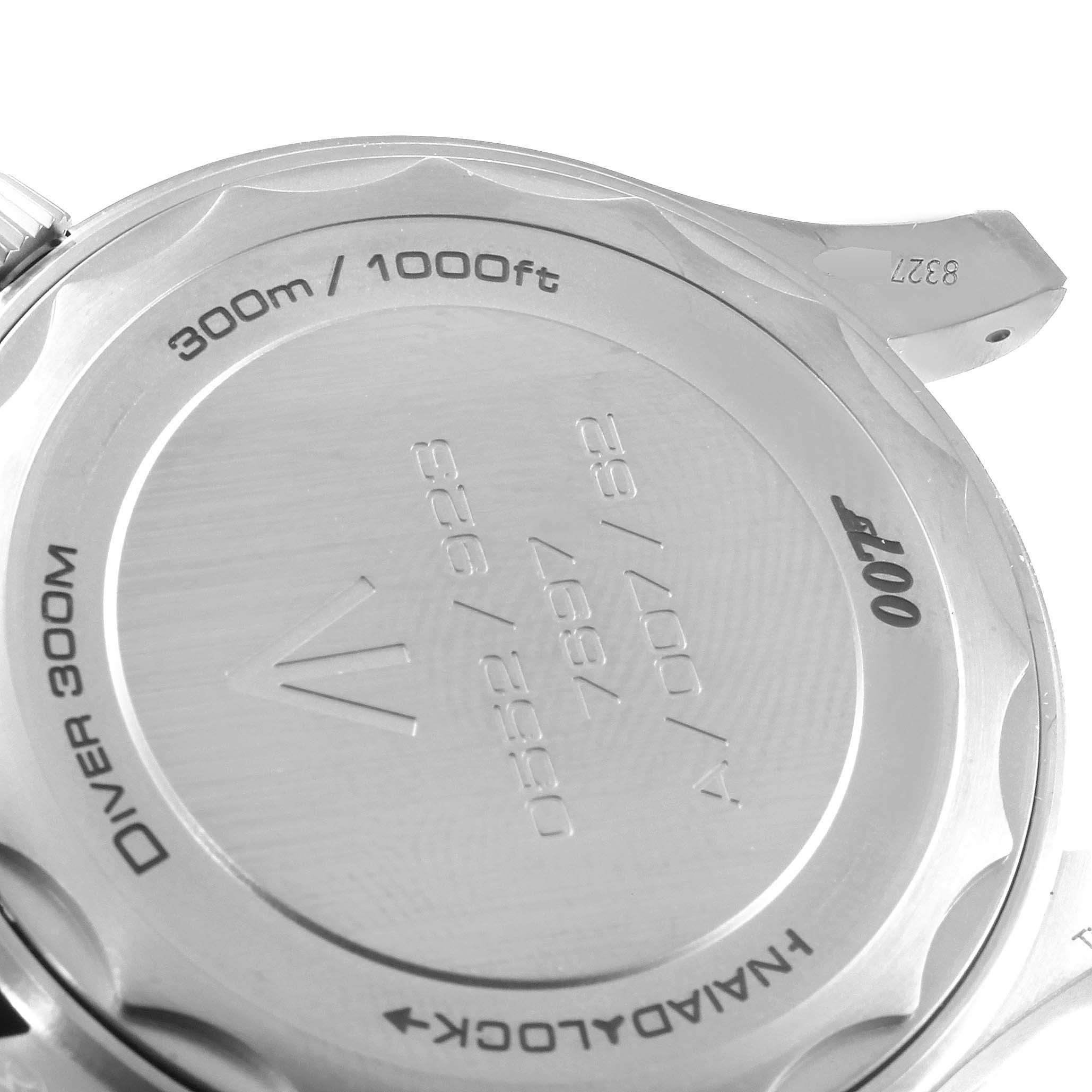 The image shows the back case of an Omega Seamaster 210.92.42.20.01.001 Men's Titanium Brown Dial 210.92.42.20.01.001 Men's Titanium Brown Dial watch, displaying its water resistance rating and serial numbers.