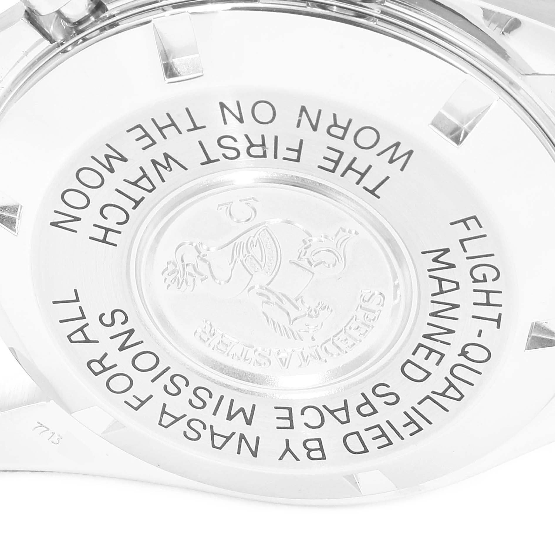 The image shows the case back of the Omega Speedmaster 3570.50.00 Men
s Stainless Steel Black Dial 3570.50.00 Men
s Stainless Steel Black Dial watch, including engraved text and logo.