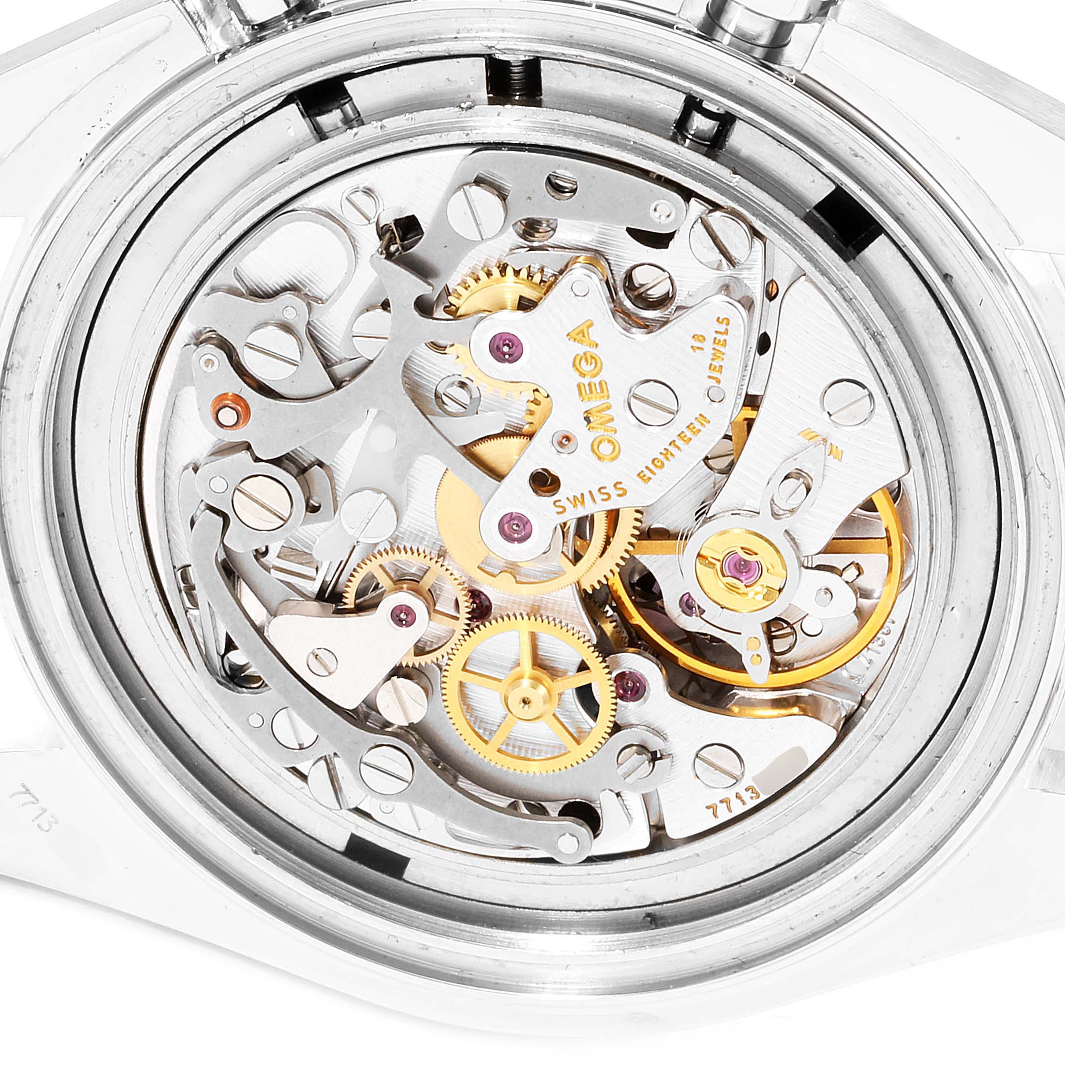The image shows the movement and inner mechanism of an Omega Speedmaster 3570.50.00 Men
s Stainless Steel Black Dial 3570.50.00 Men
s Stainless Steel Black Dial watch from a close-up, top-down angle.